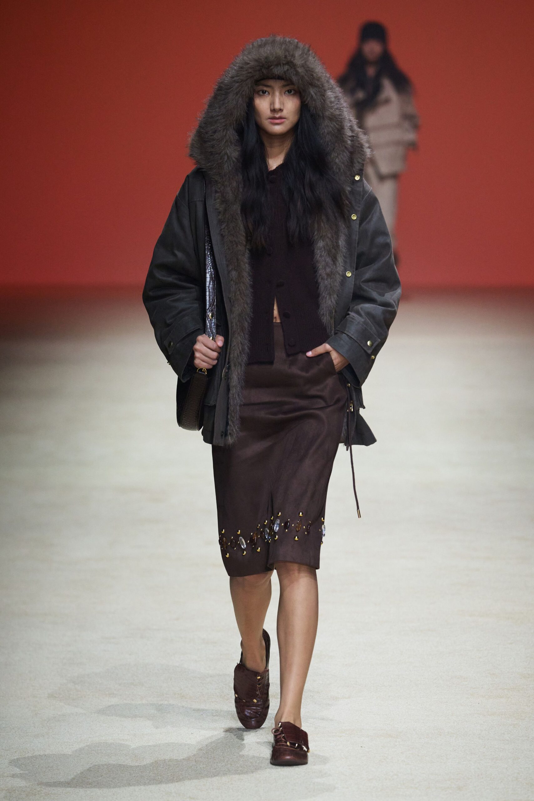 black leather long-sleeve hooded relaxed zippered coat