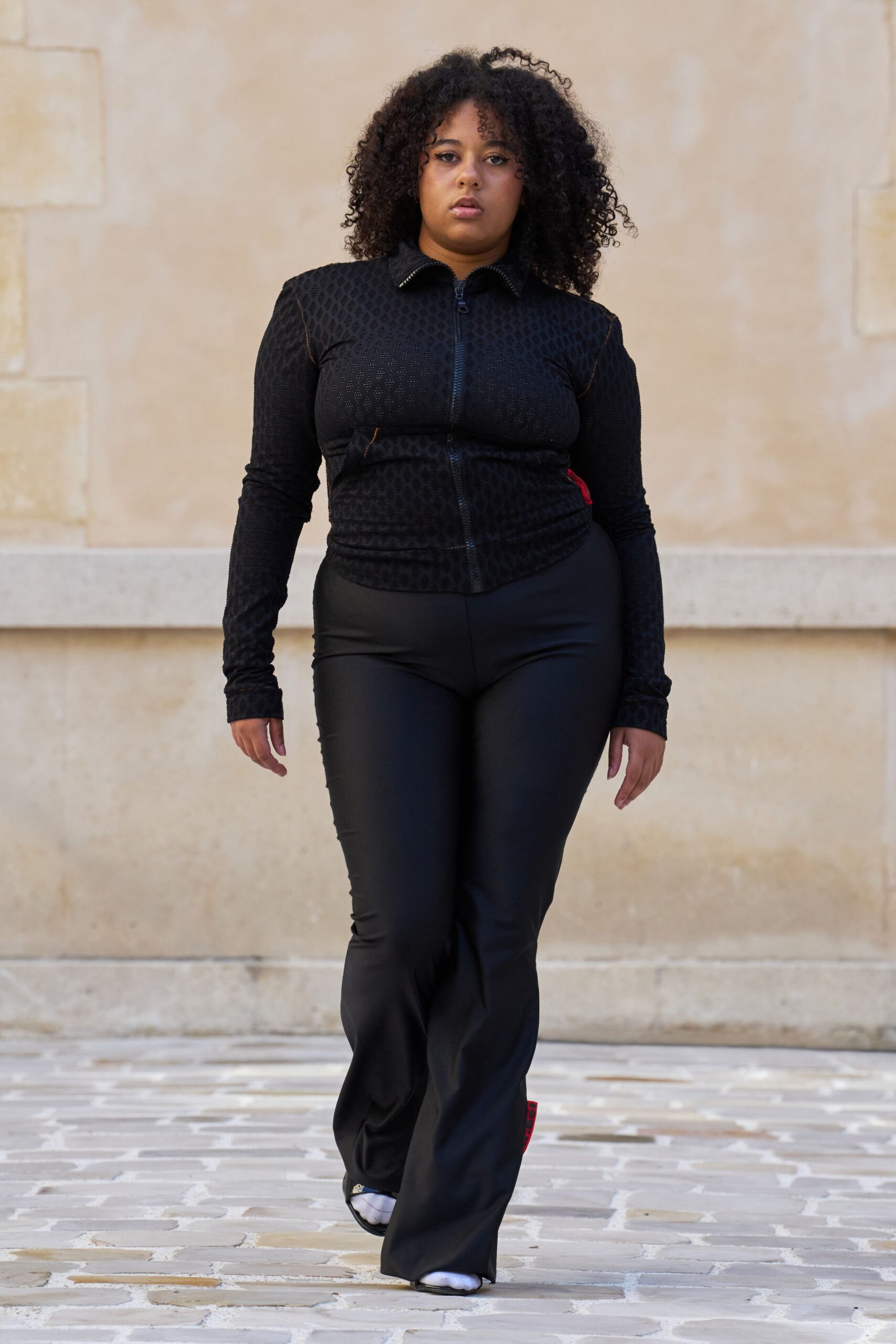 black cotton long-sleeve collared fitted zippered textured jacket