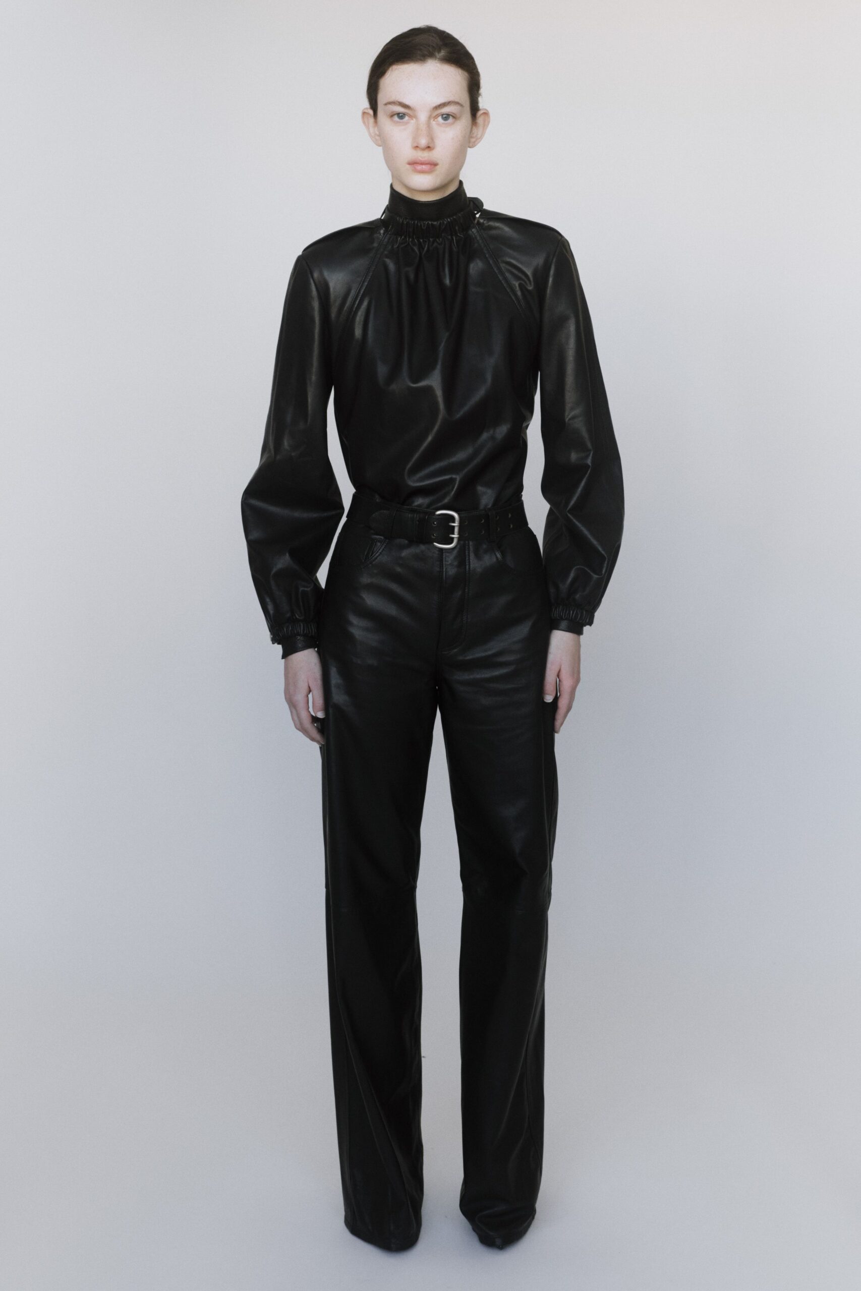 black leather fitted top and pants