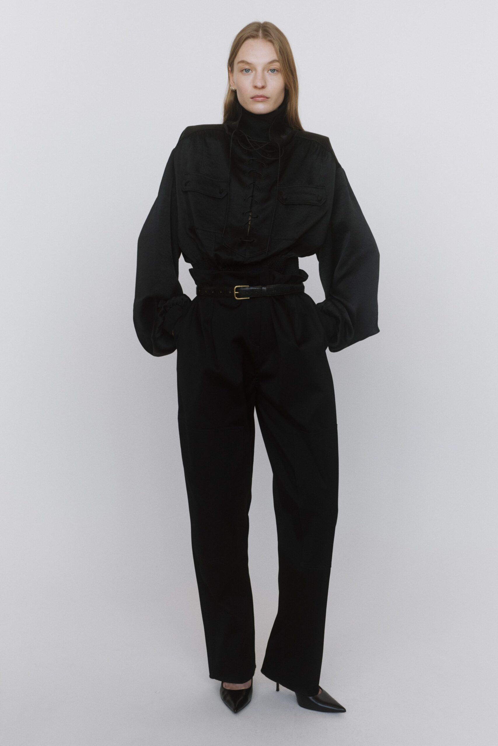 black fitted shirt and tailored pants