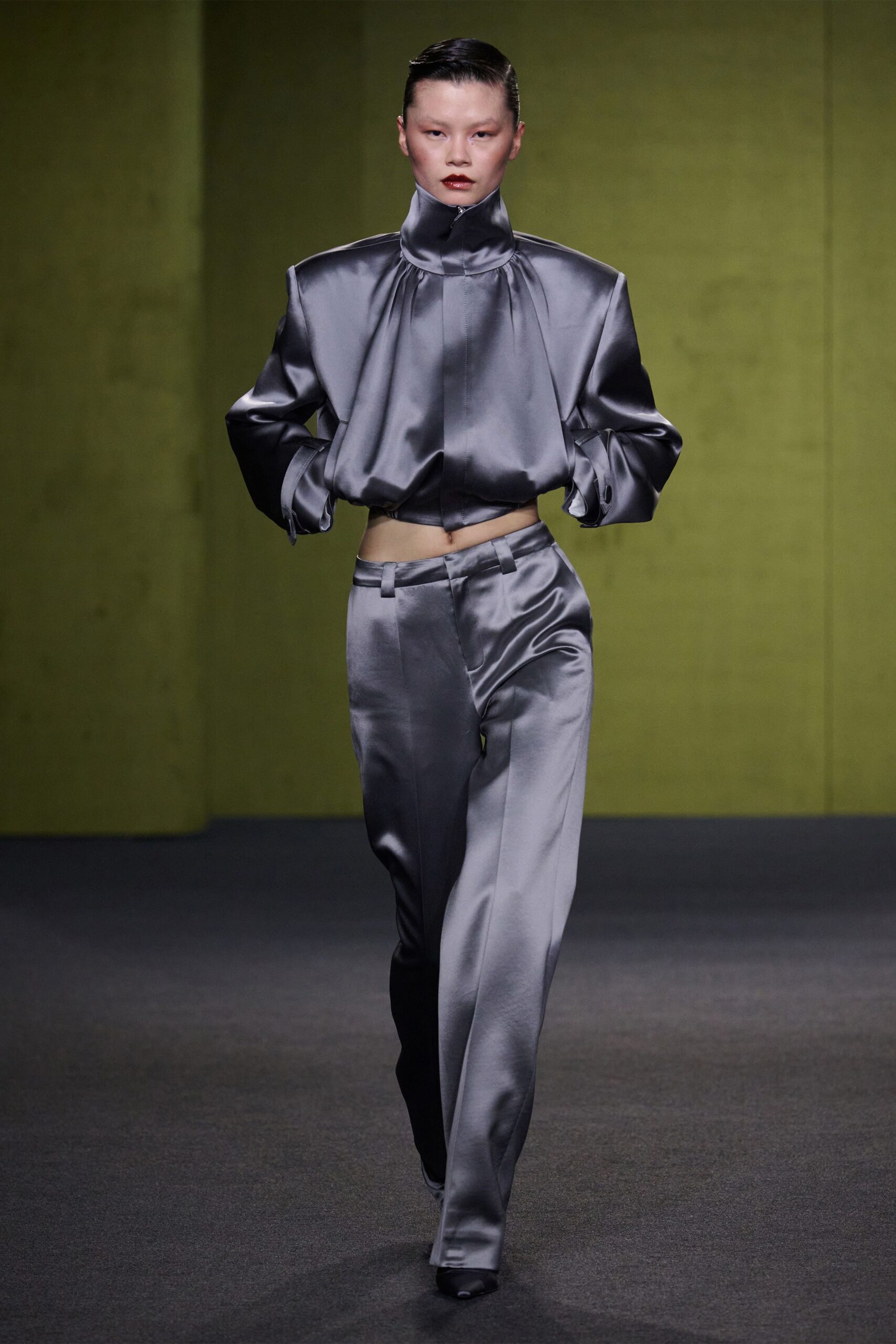 gray silk long-sleeve high-neck fitted pleated shiny top