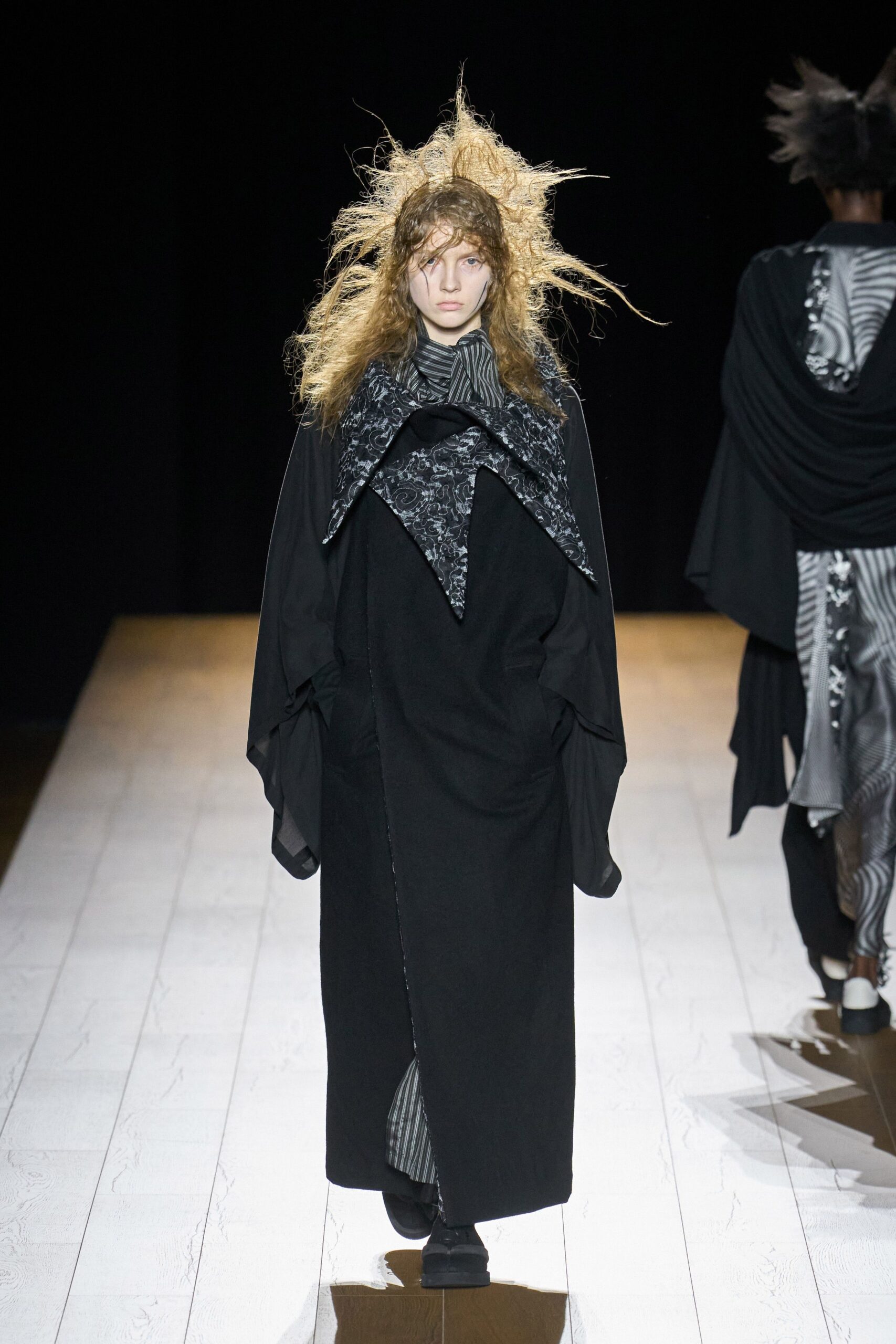 black wool coat with striped dress