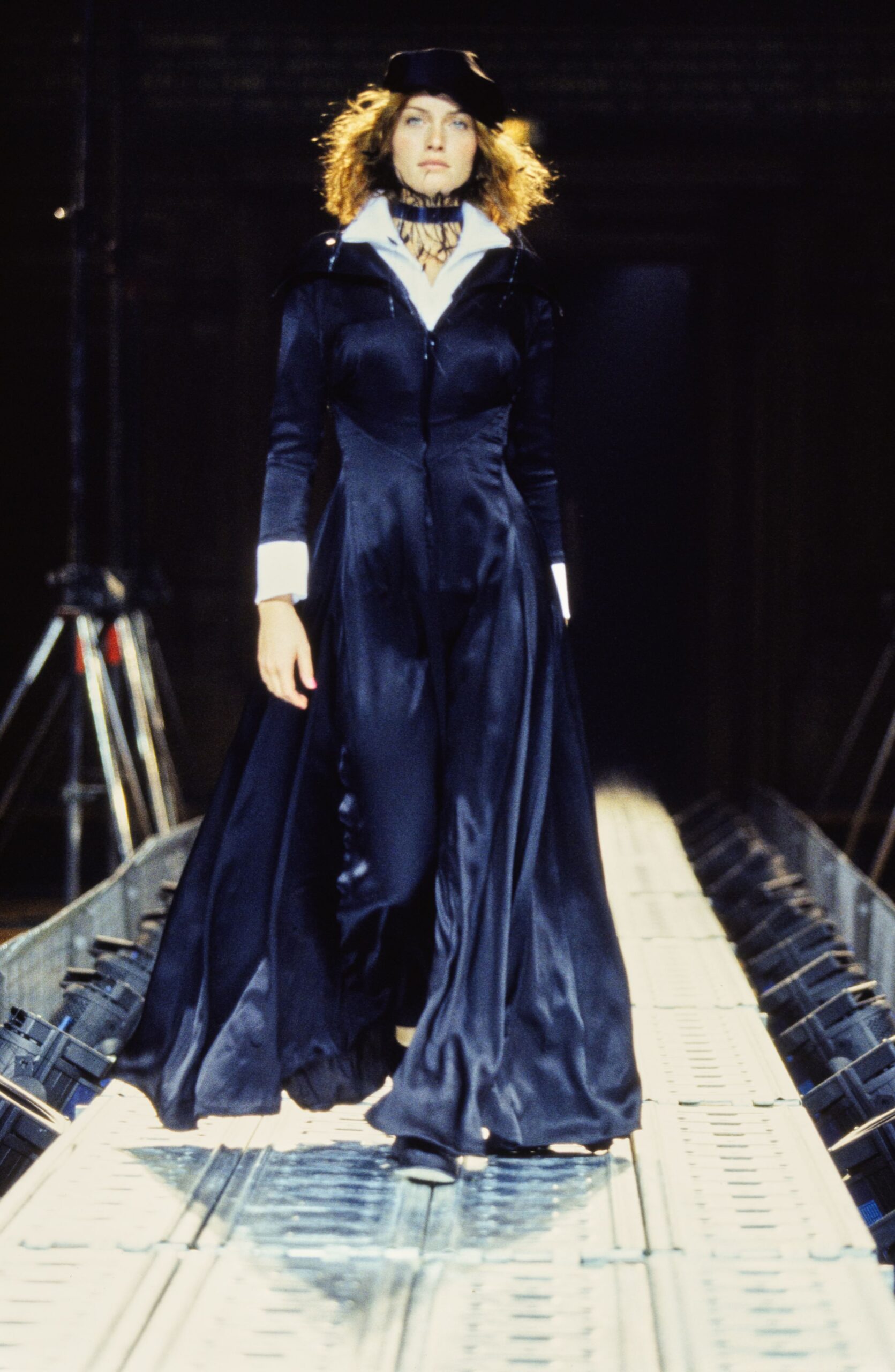 black silk long-sleeve collared fitted draped flowing gown
