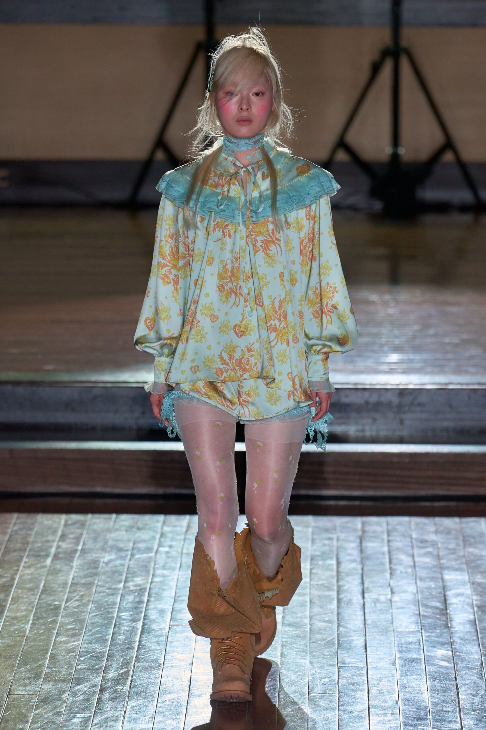 blue cotton long-sleeve collared relaxed floral ruffled blouse
