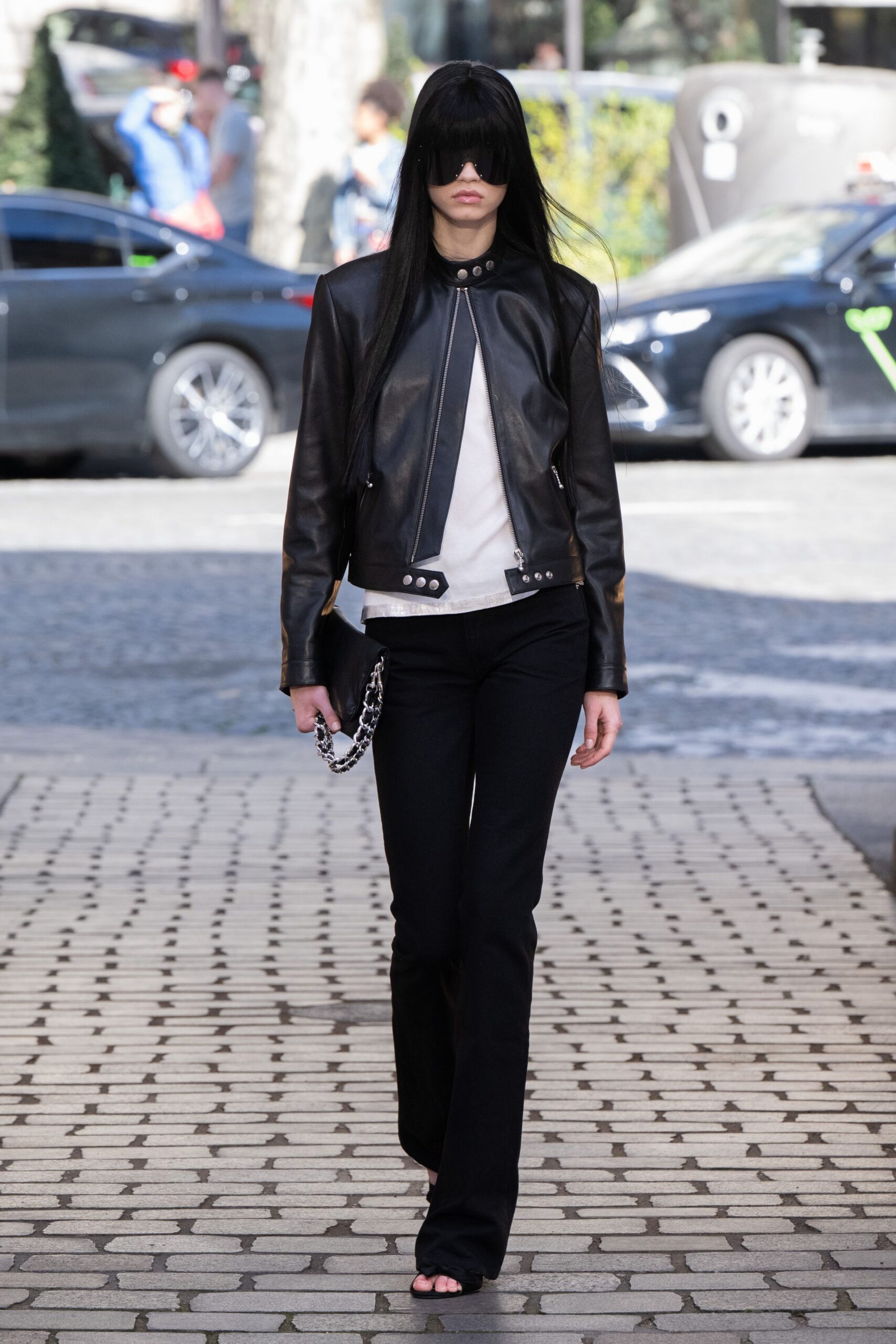 black leather jacket with flared pants