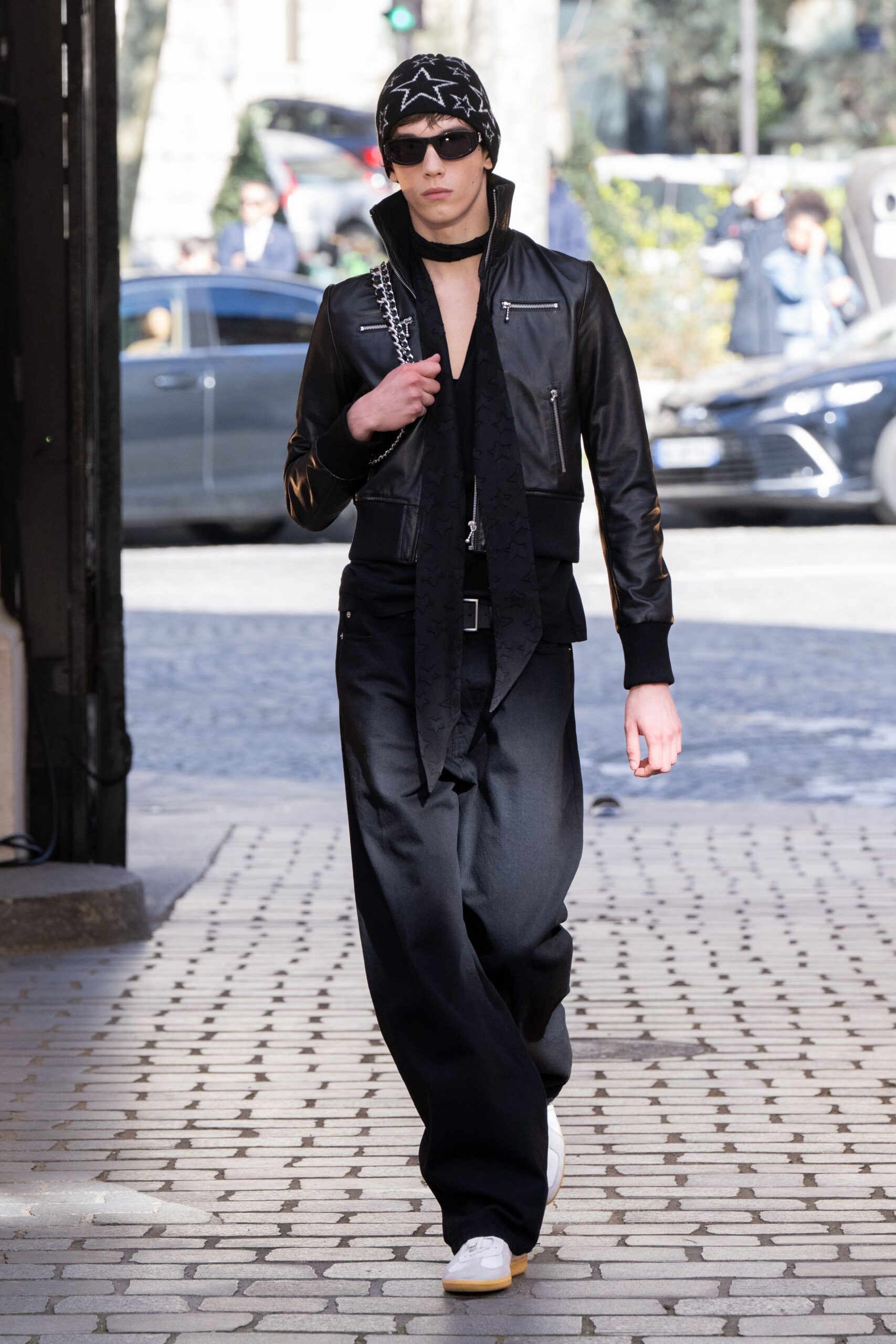 black leather jacket with wide-leg pants