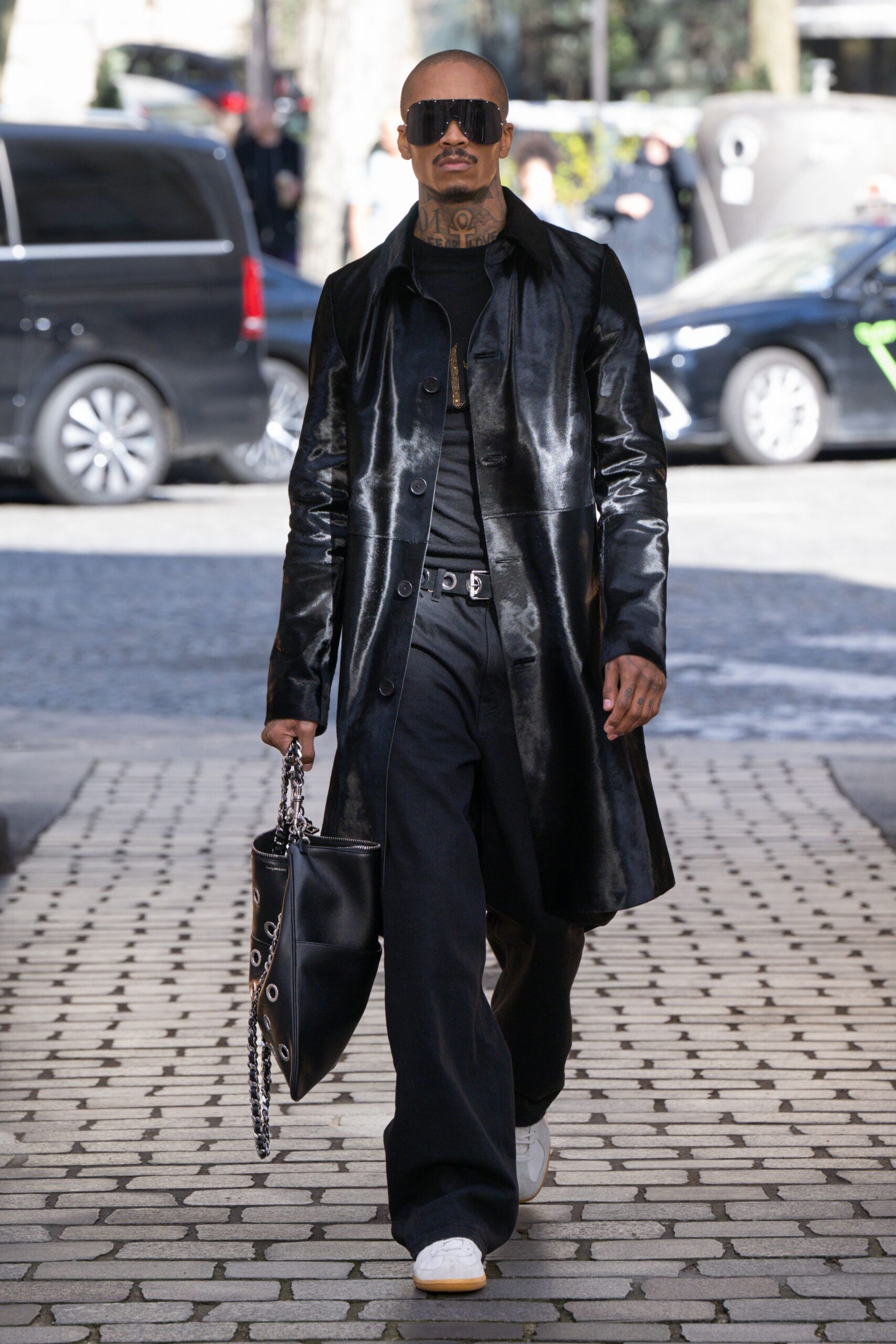 black leather long-sleeve collared fitted zippered shiny coat