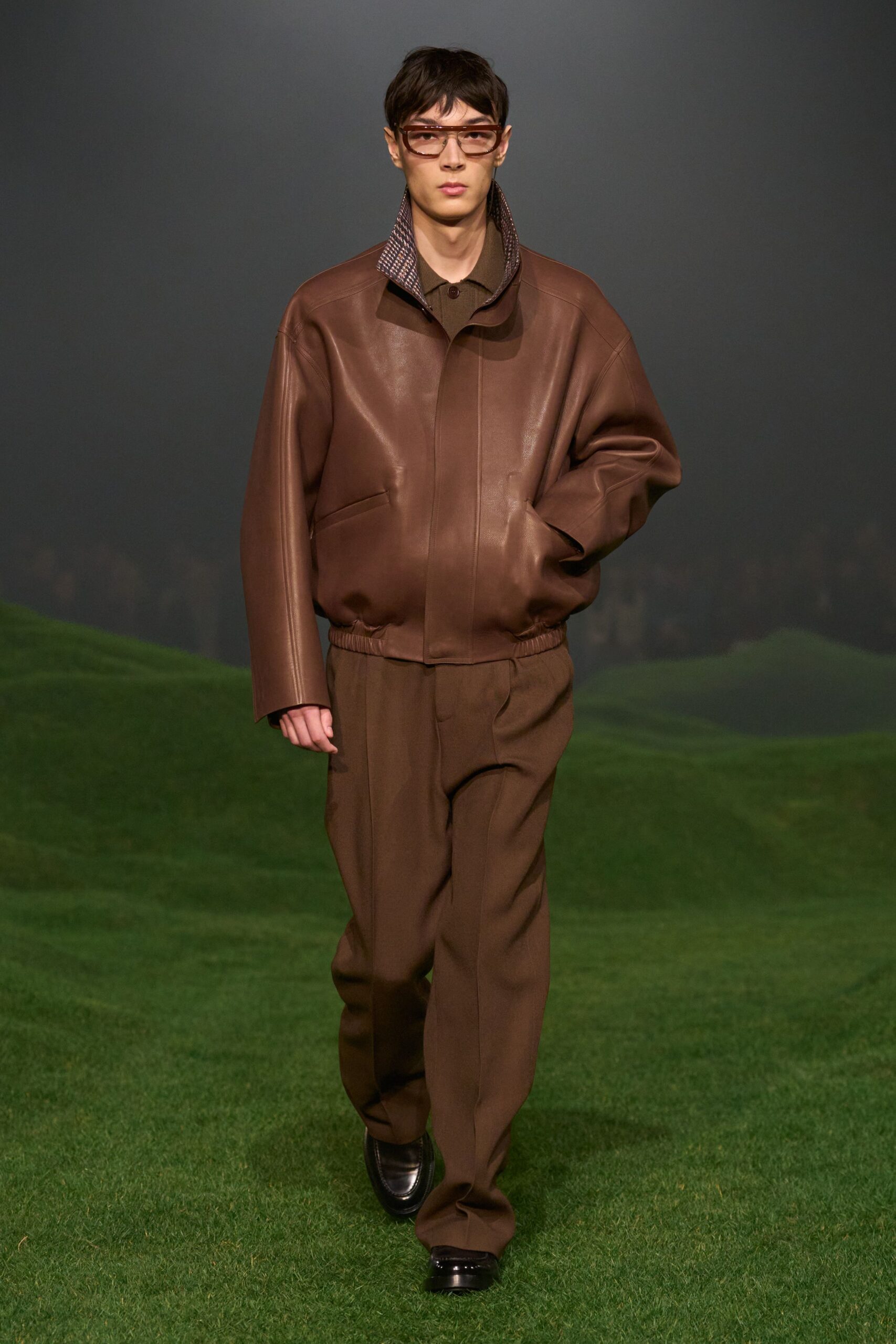 brown leather jacket with relaxed pants