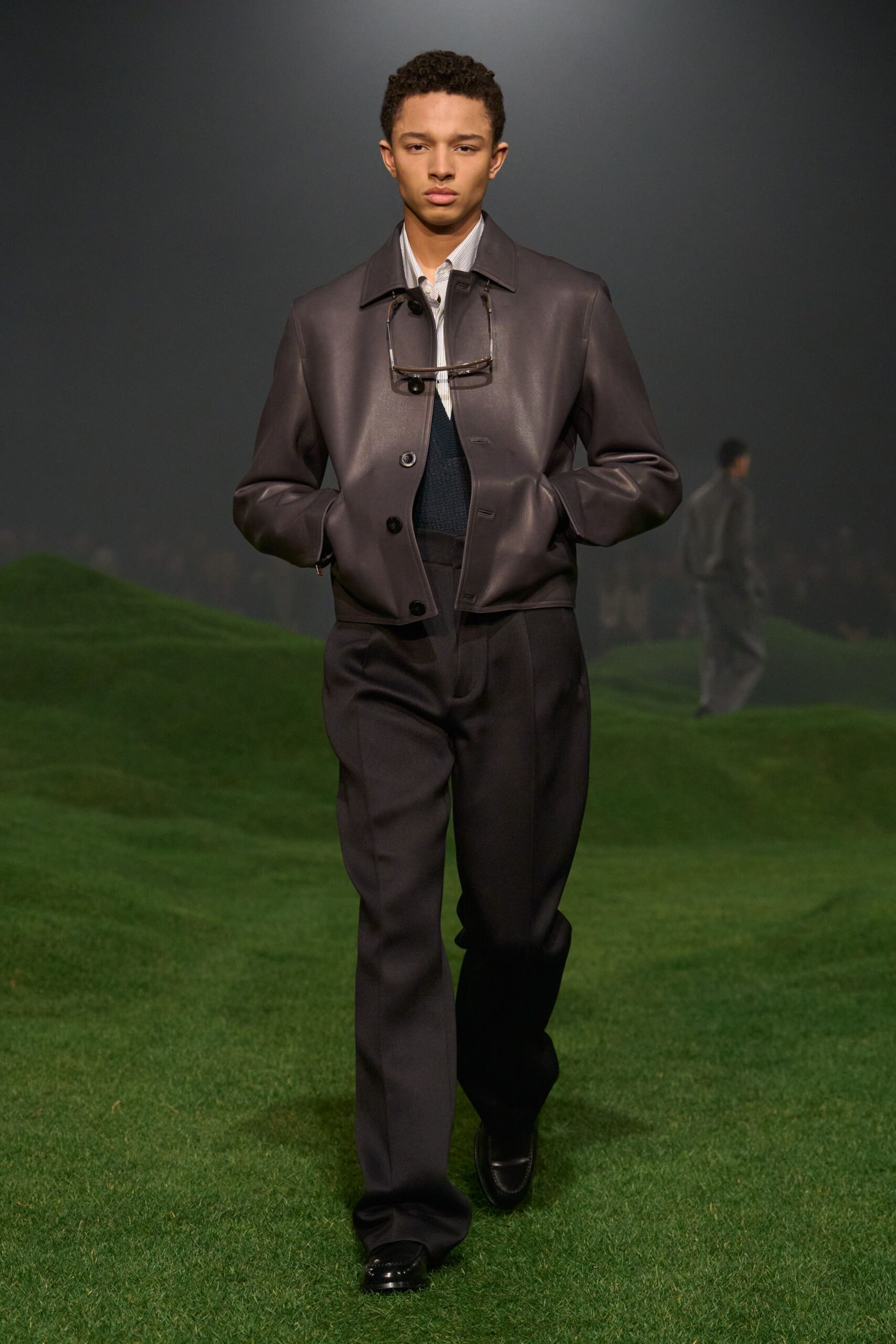 black leather jacket and tailored pants