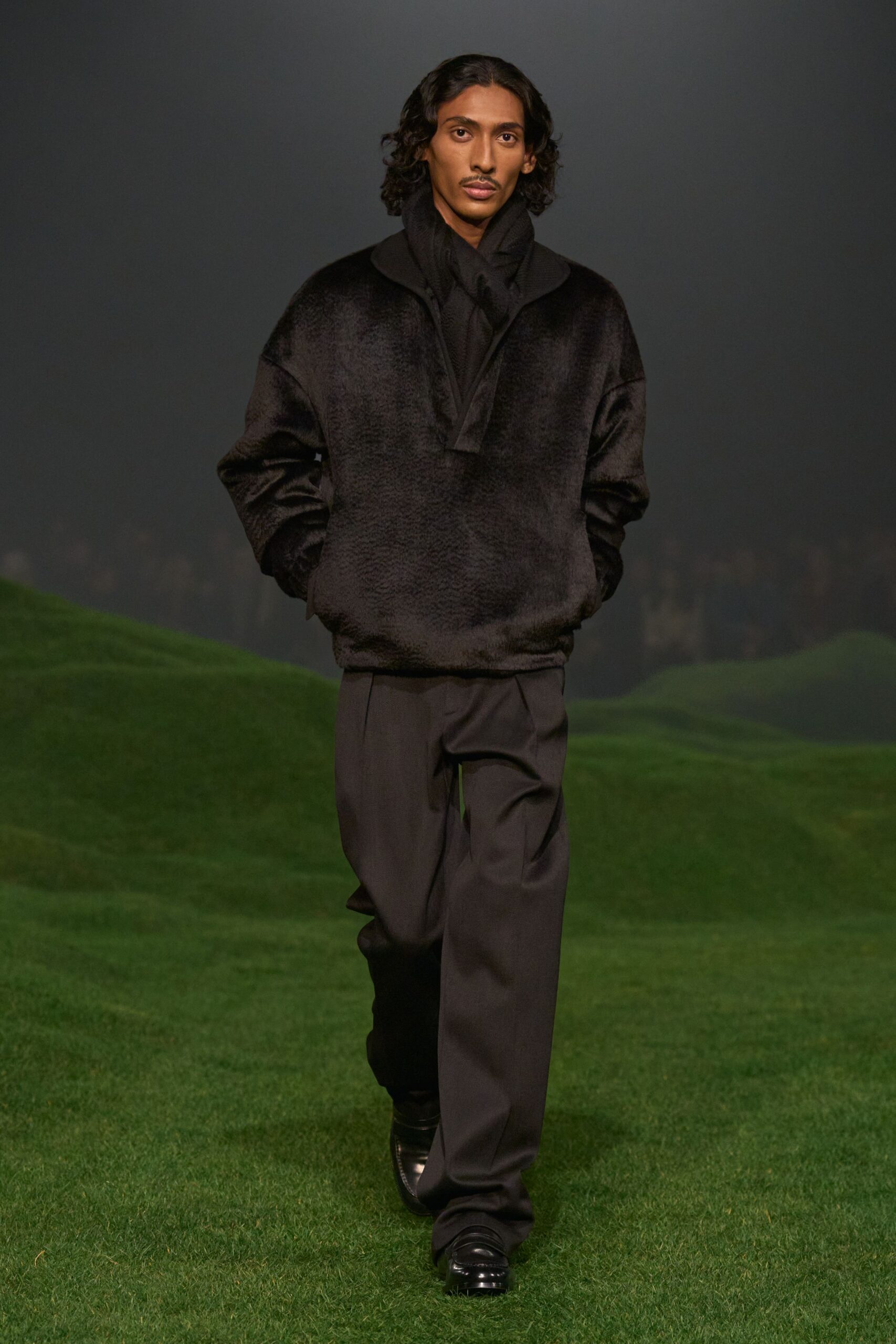 black fur jacket with tailored pants