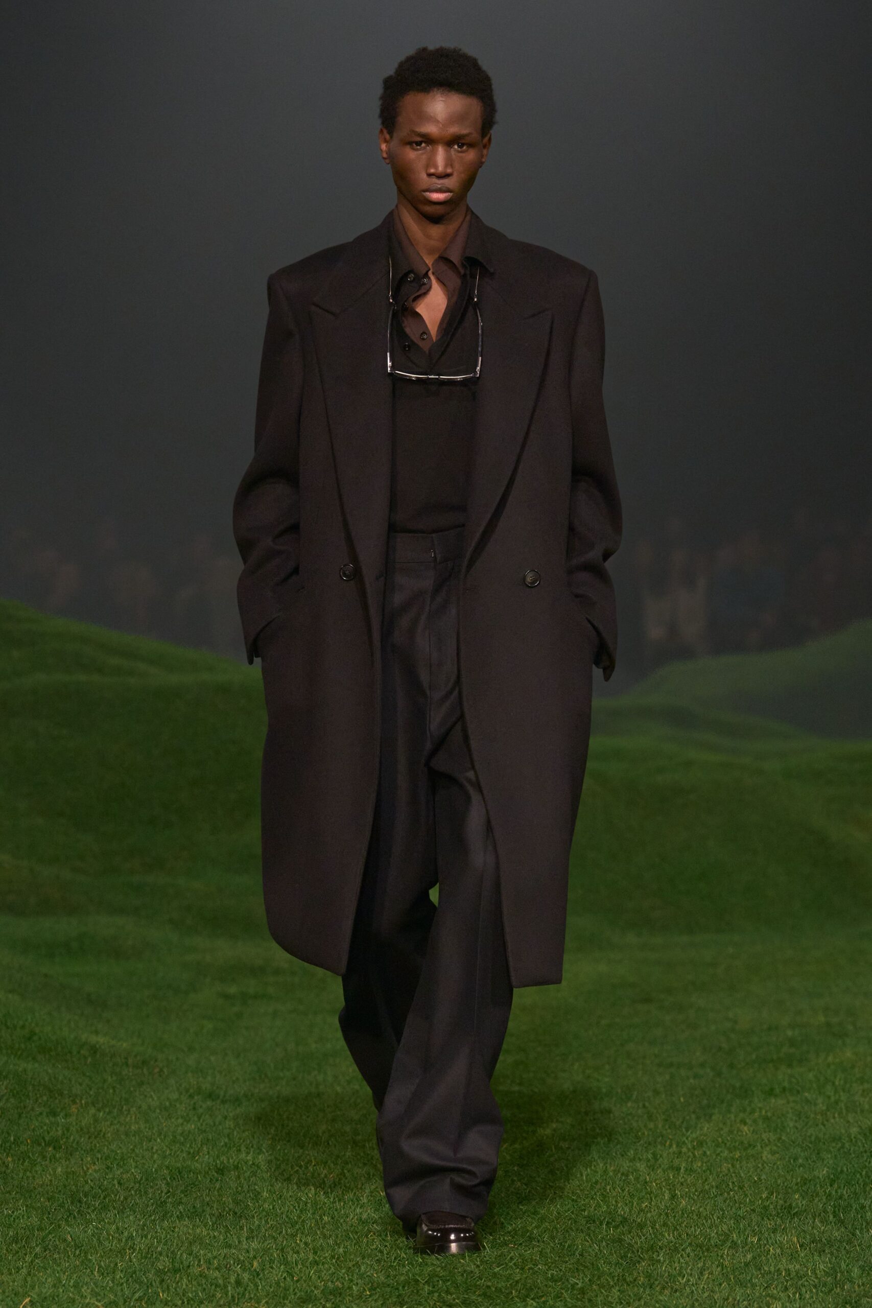 black wool coat with tailored pants