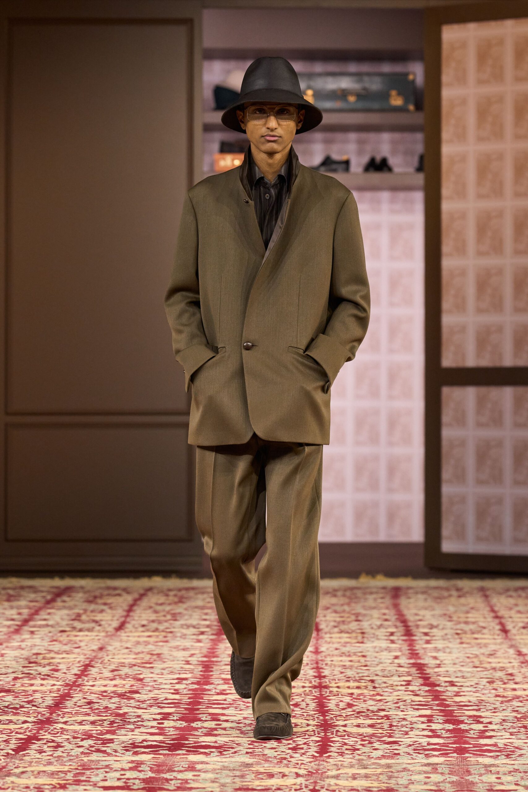 brown long-sleeve collared tailored suit