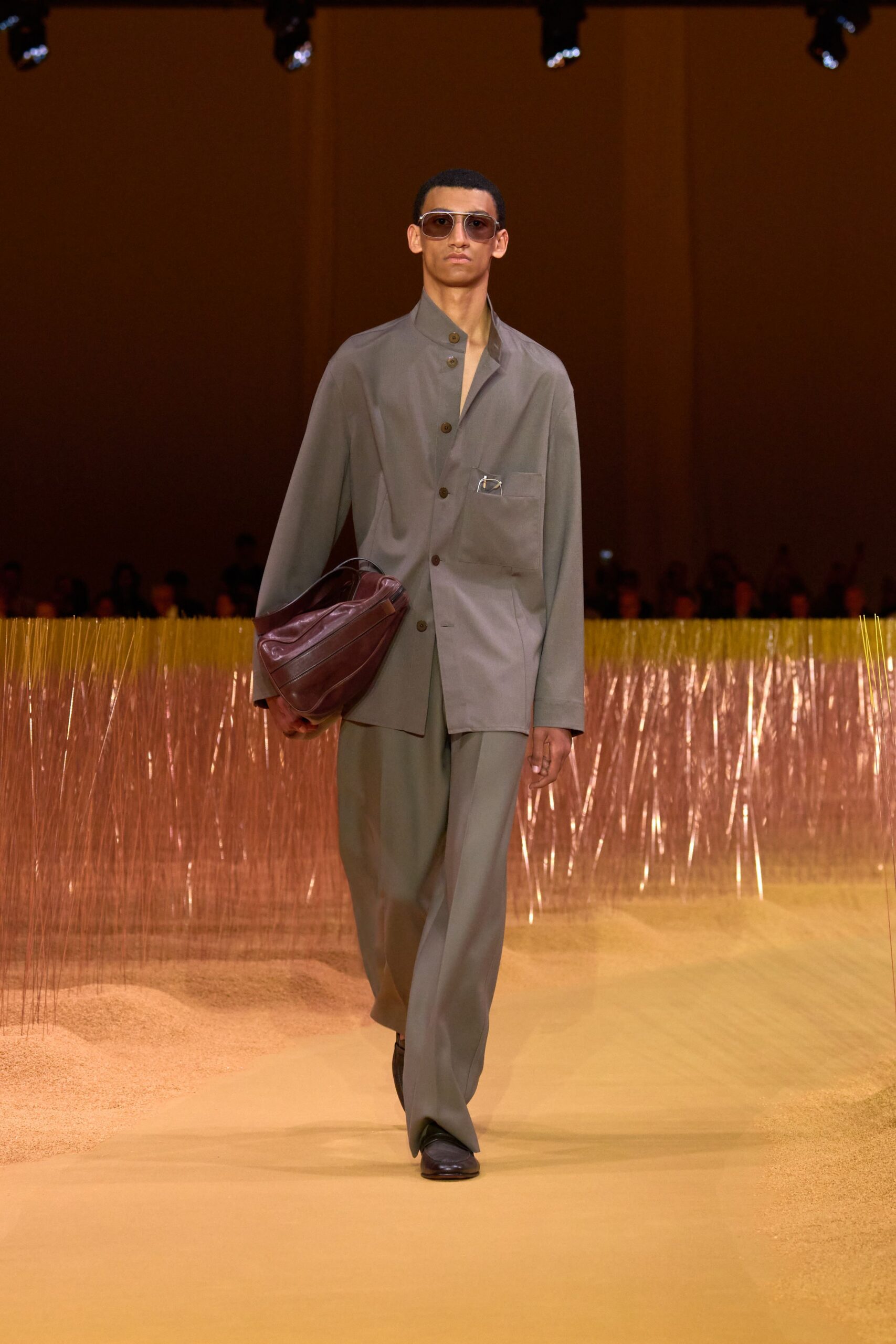 gray relaxed suit with sunglasses