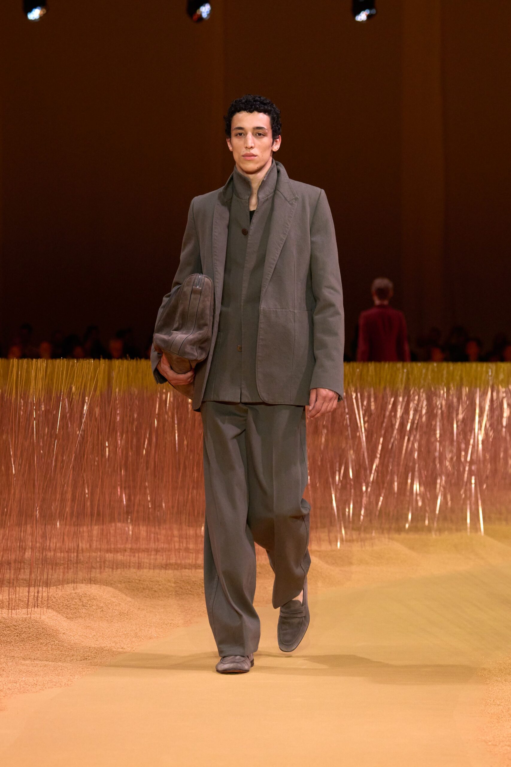 gray tailored suit with suede shoes