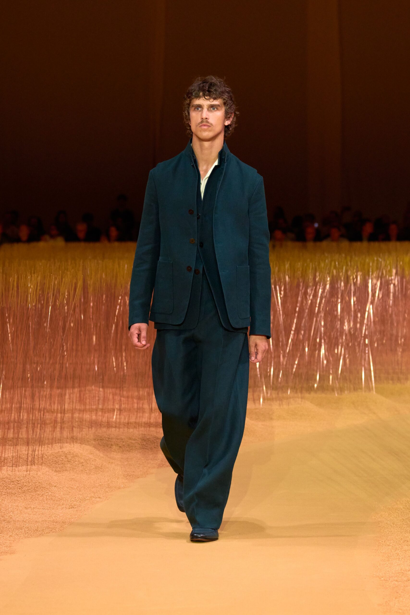 blue tailored suit with black shoes
