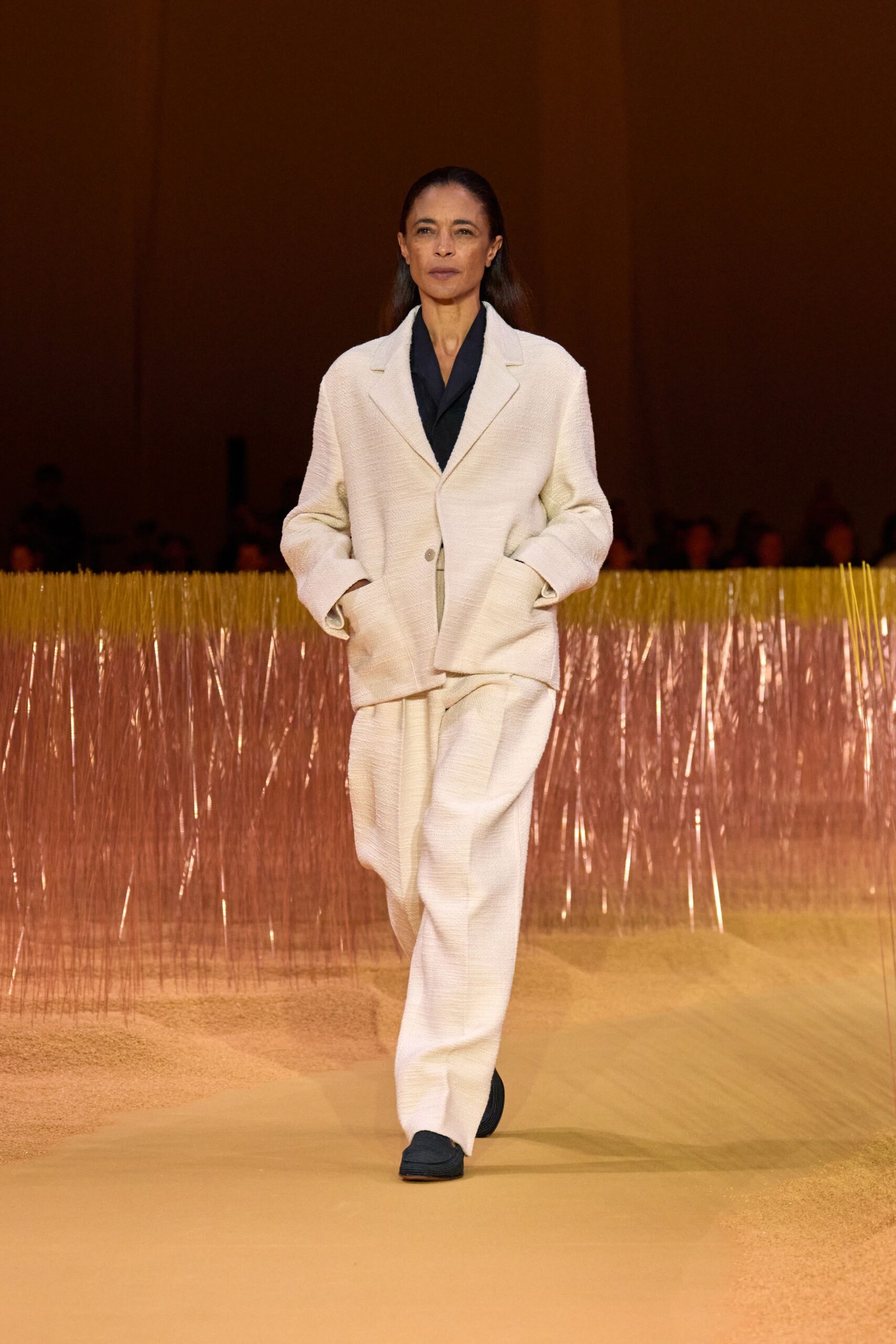 white relaxed suit with black shoes