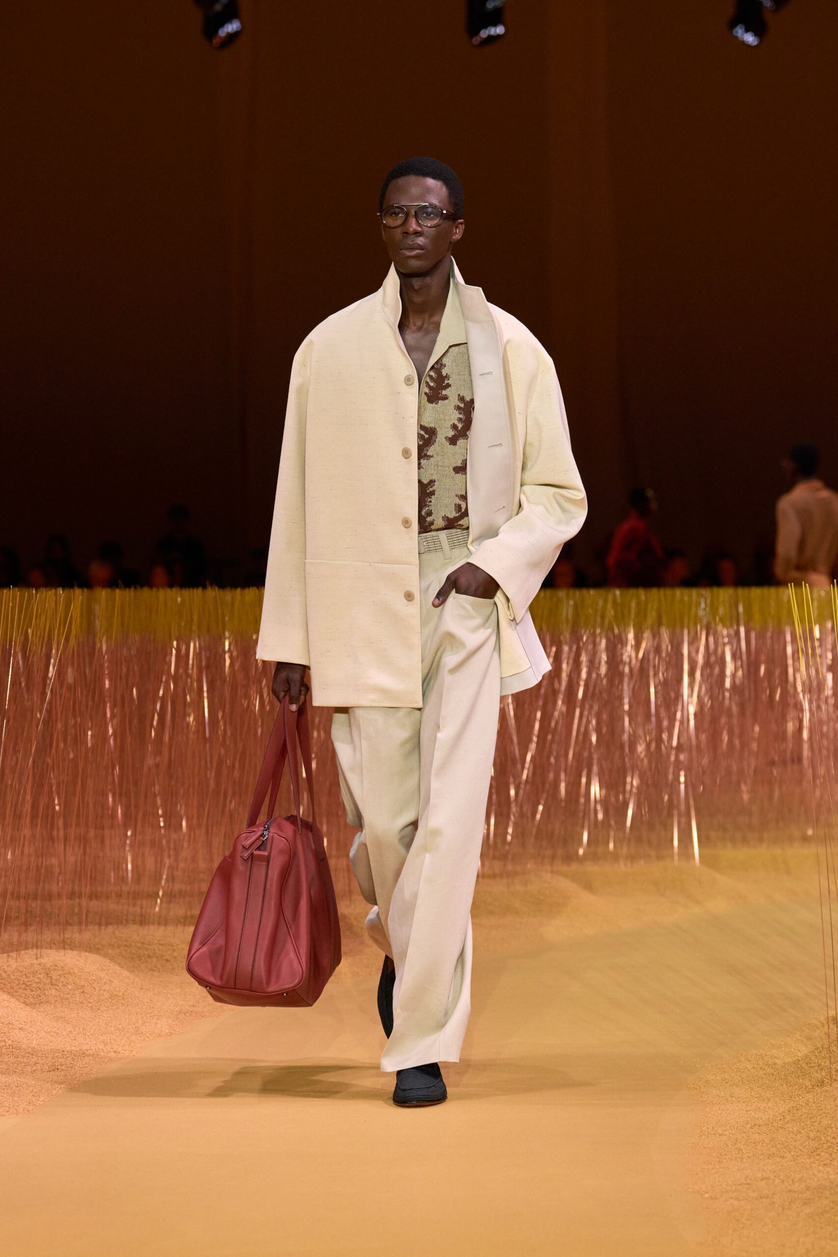 beige jacket green shirt tailored pants