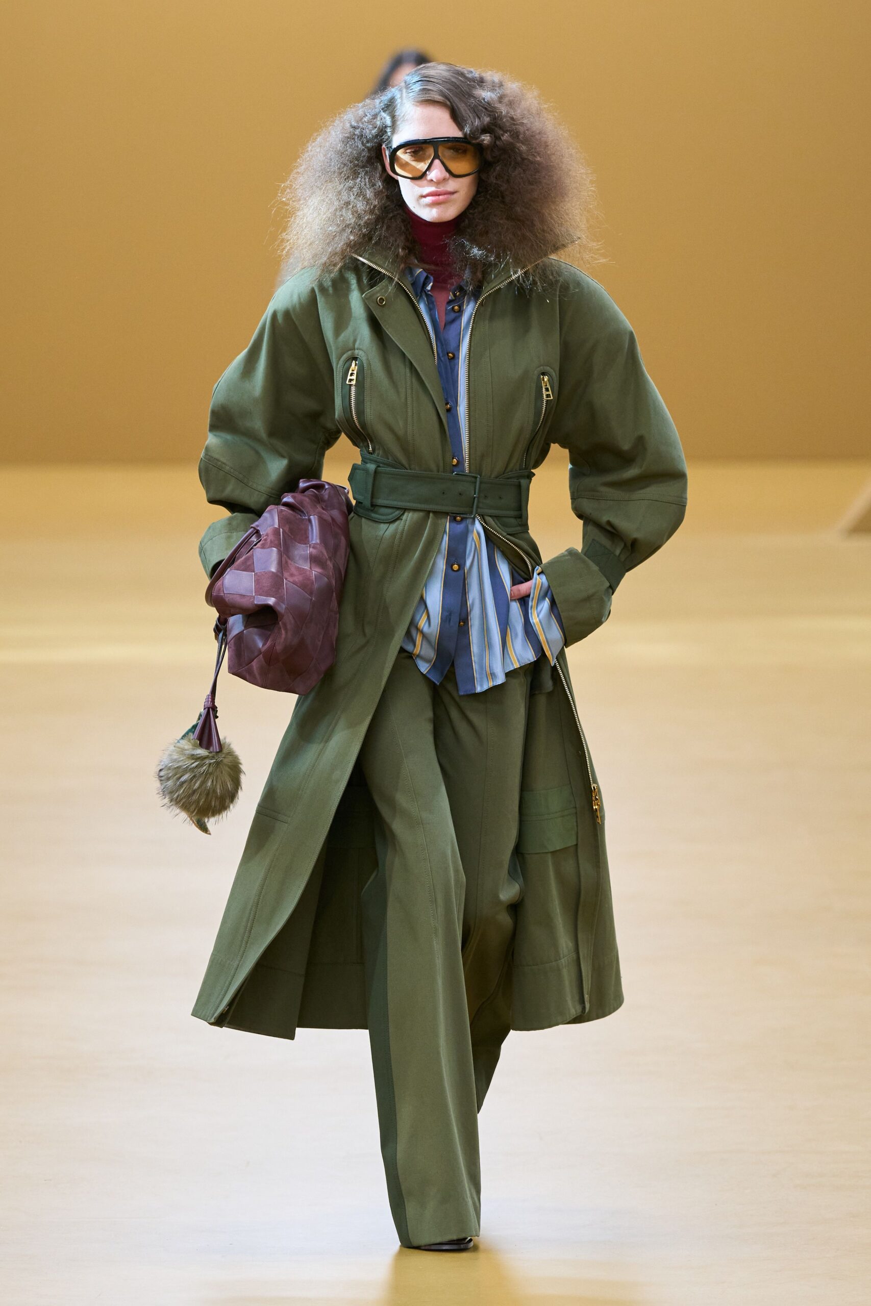 green relaxed coat with blue shirt