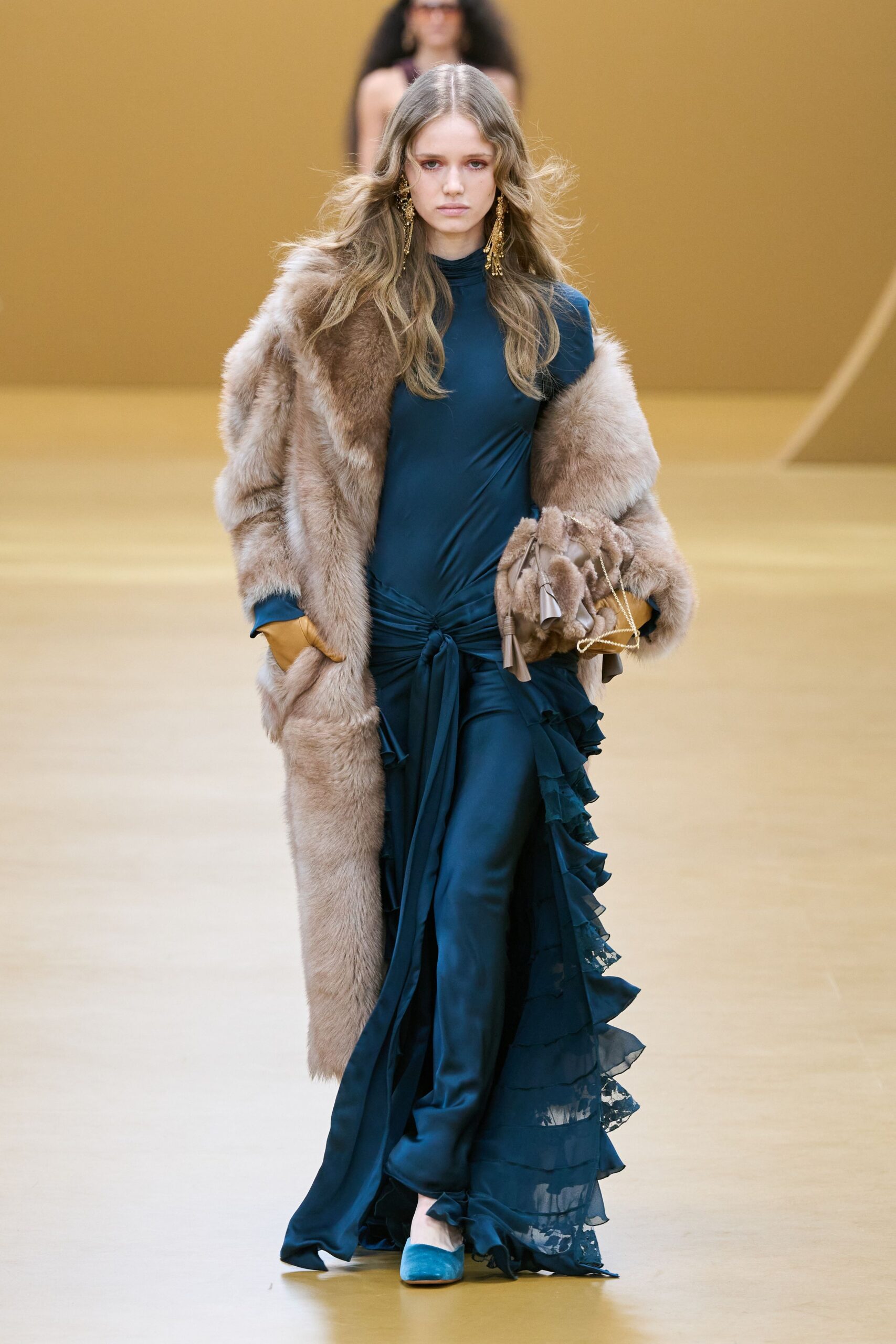 teal silk fitted gown with fur coat