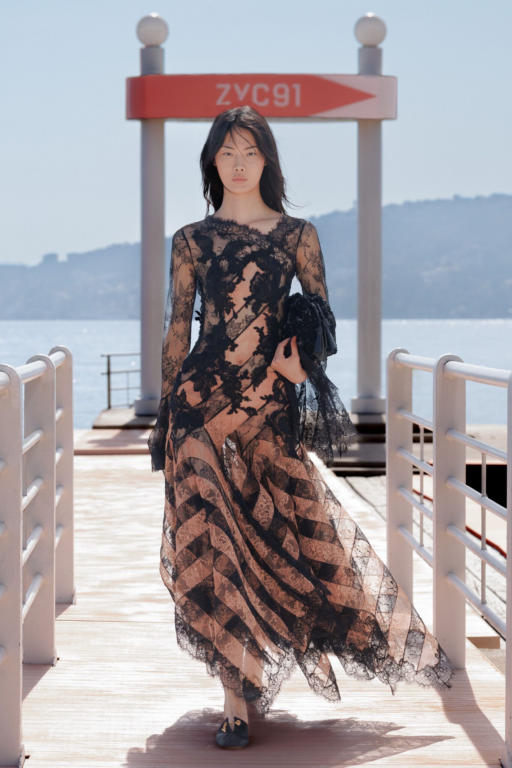 black lace long-sleeve v-neck fitted layered flared gown