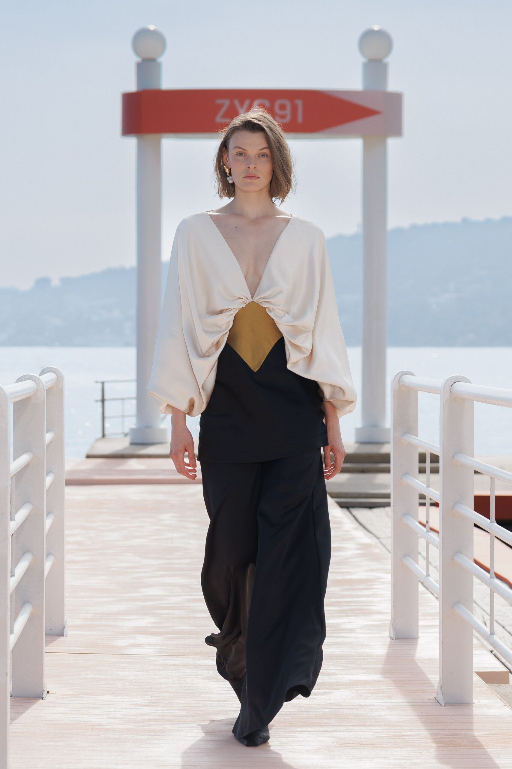 white silk long-sleeve v-neck relaxed draped top