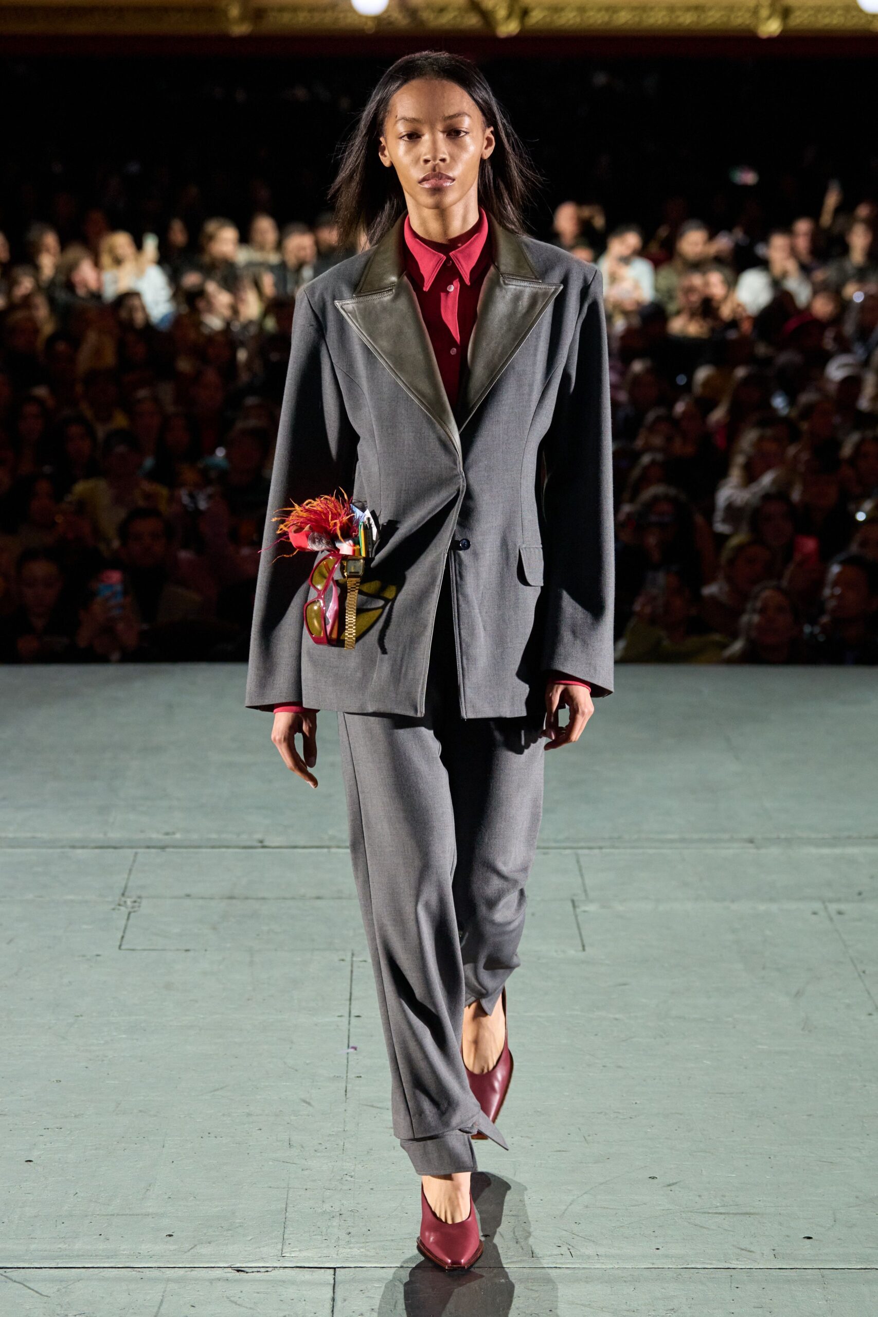 gray tailored suit with red shirt