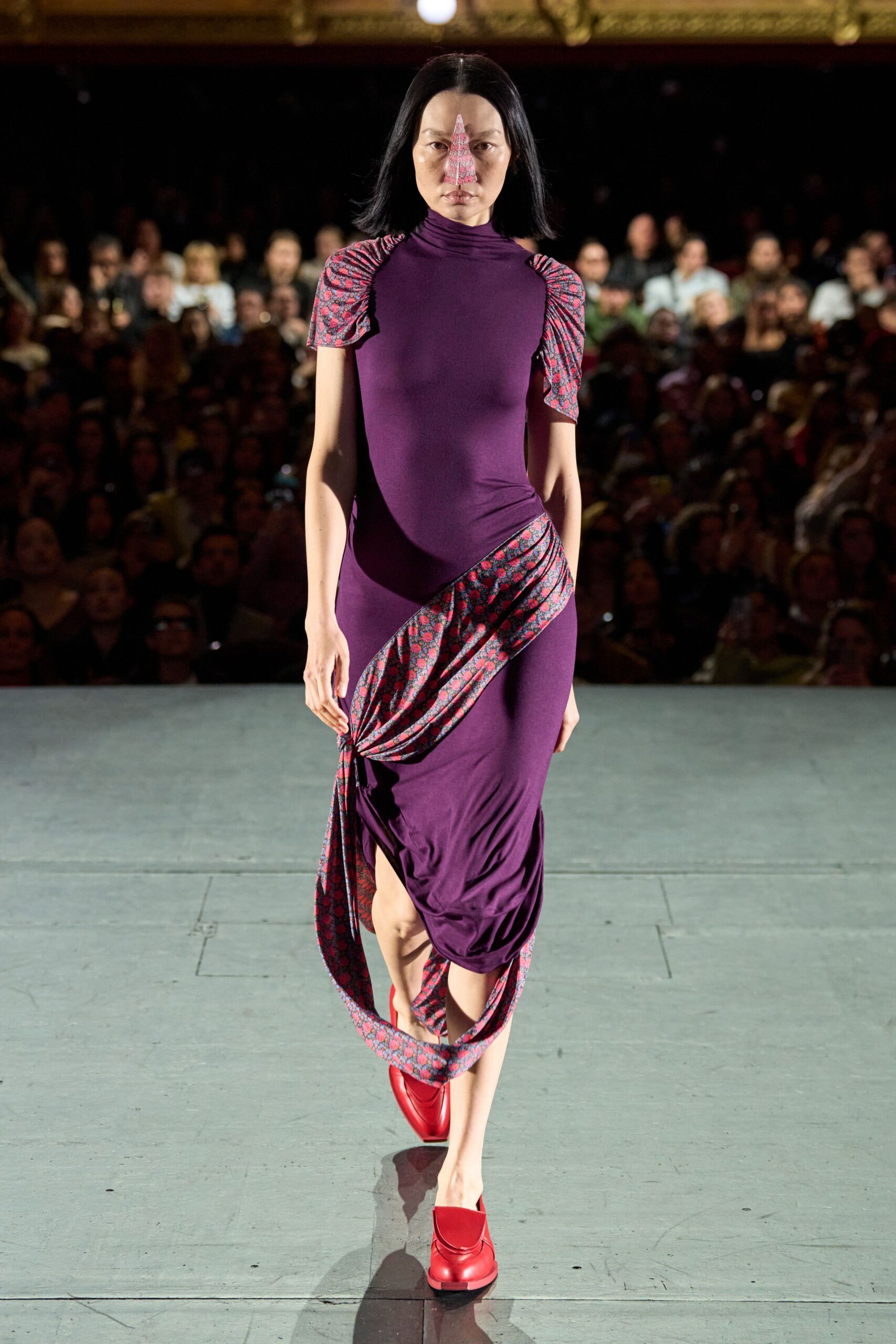 purple fitted midi dress with red shoes