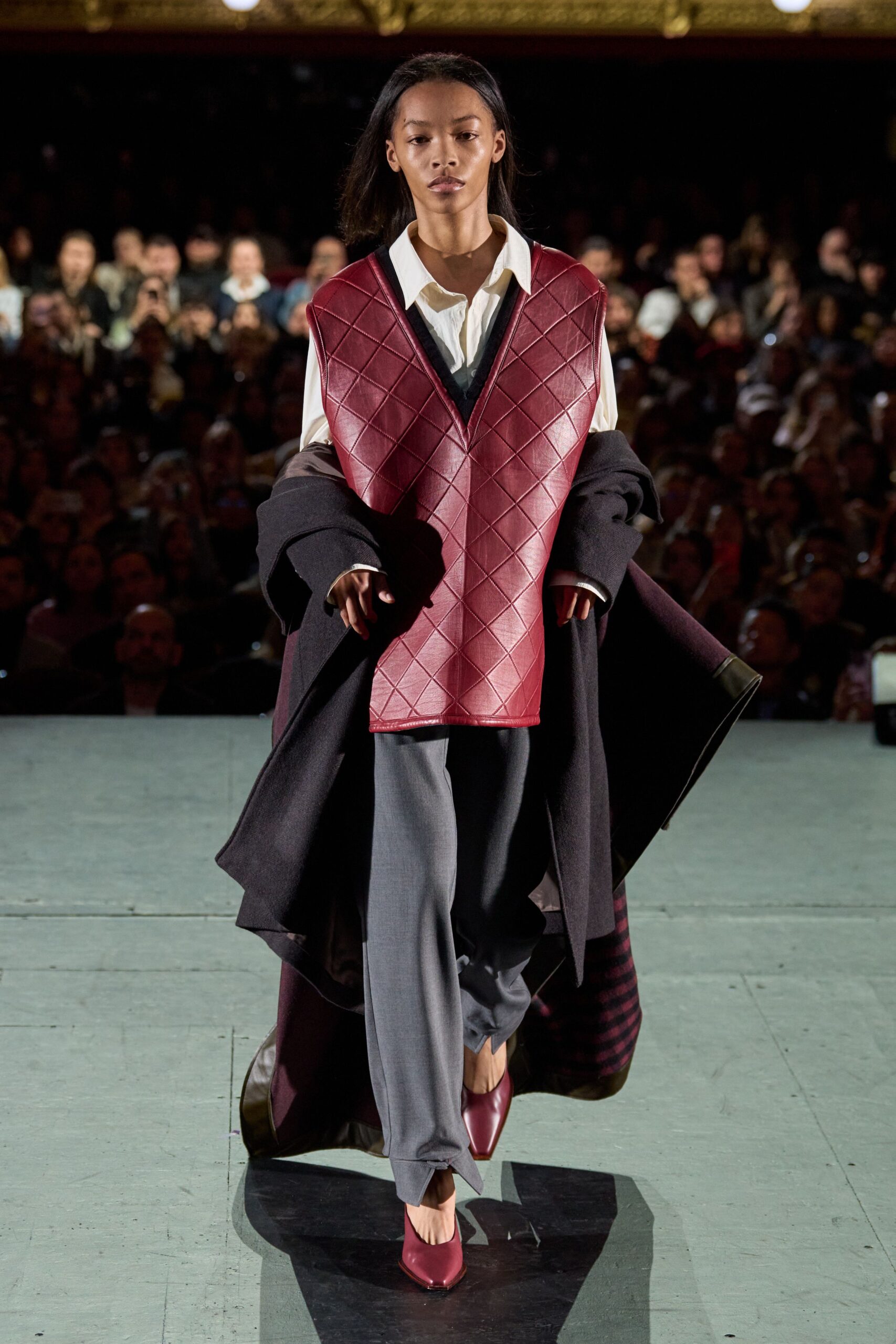 black wool coat with red vest