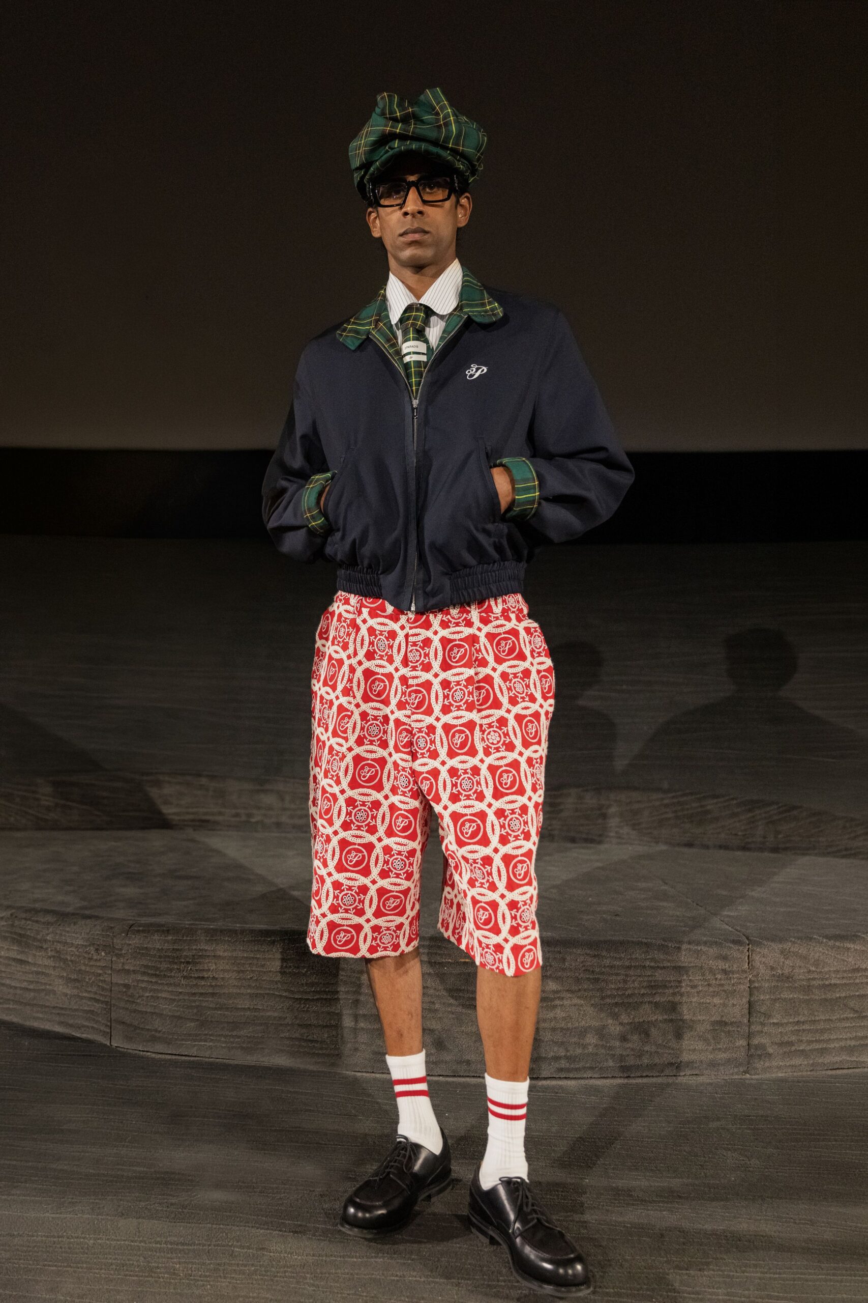 navy jacket red printed shorts