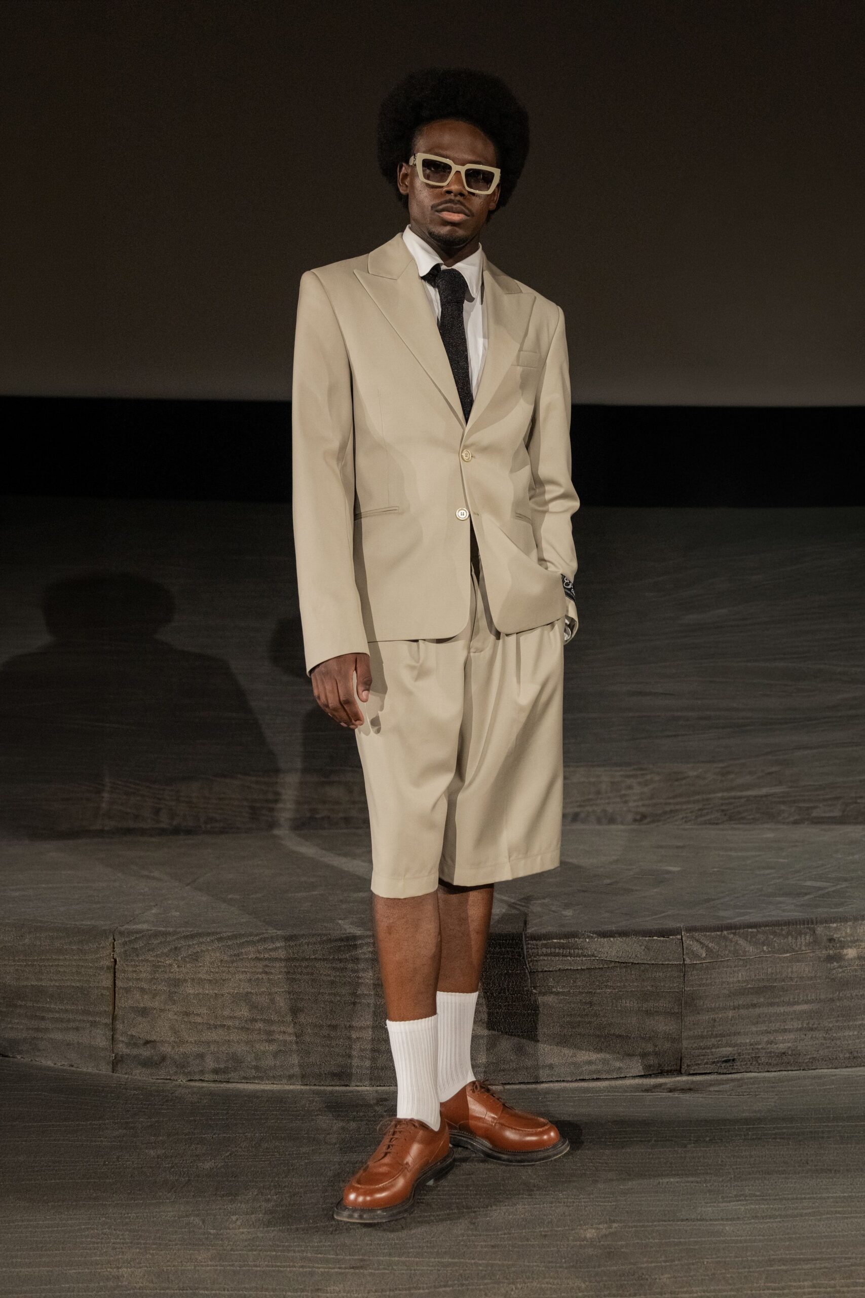 beige tailored suit with shorts