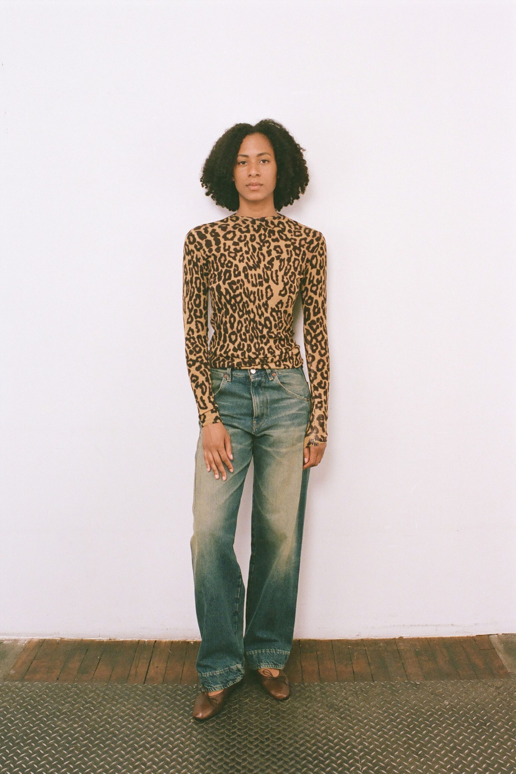 brown cotton long-sleeve high-neck fitted animal-print top