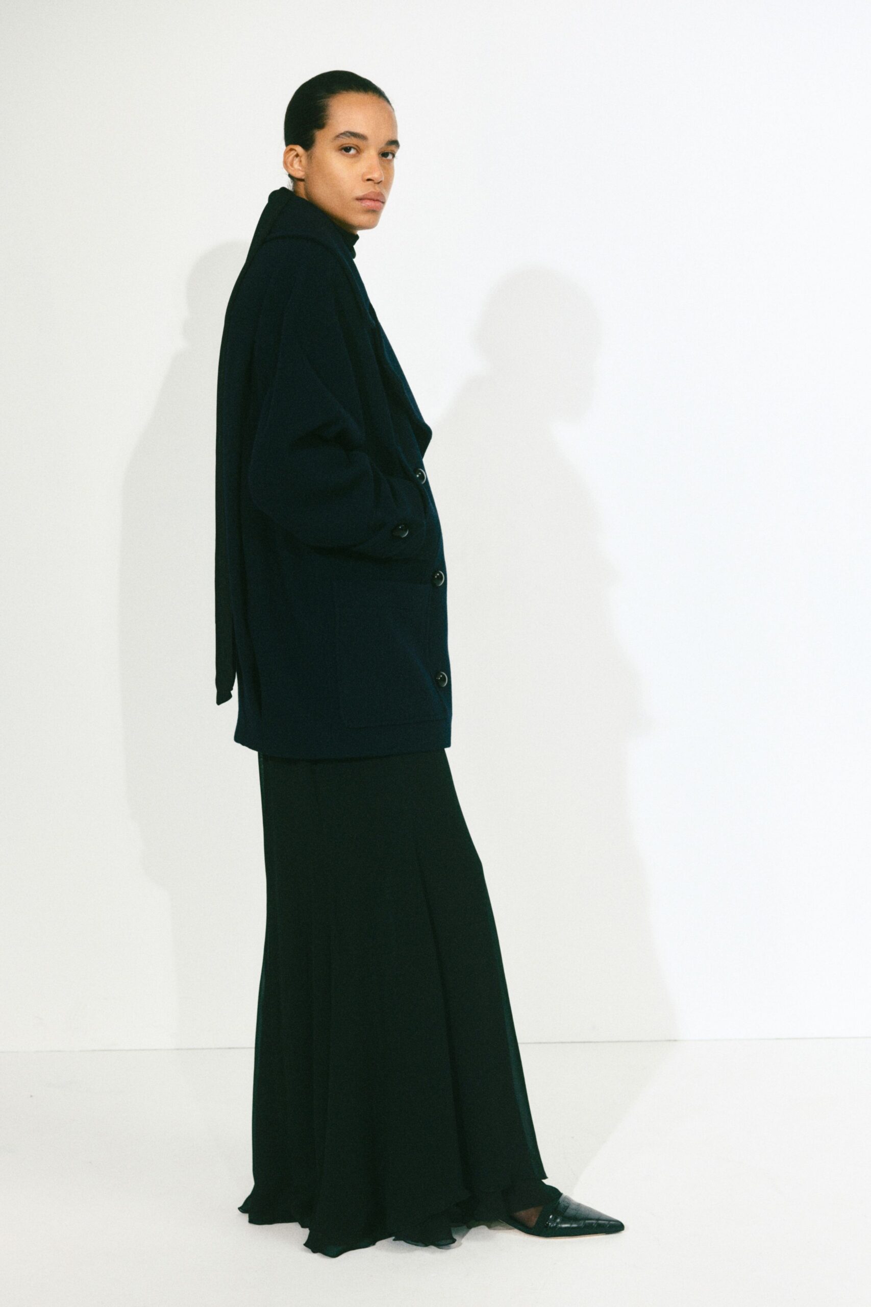 black silk sleeveless v-neck fitted flowing maxi dress
