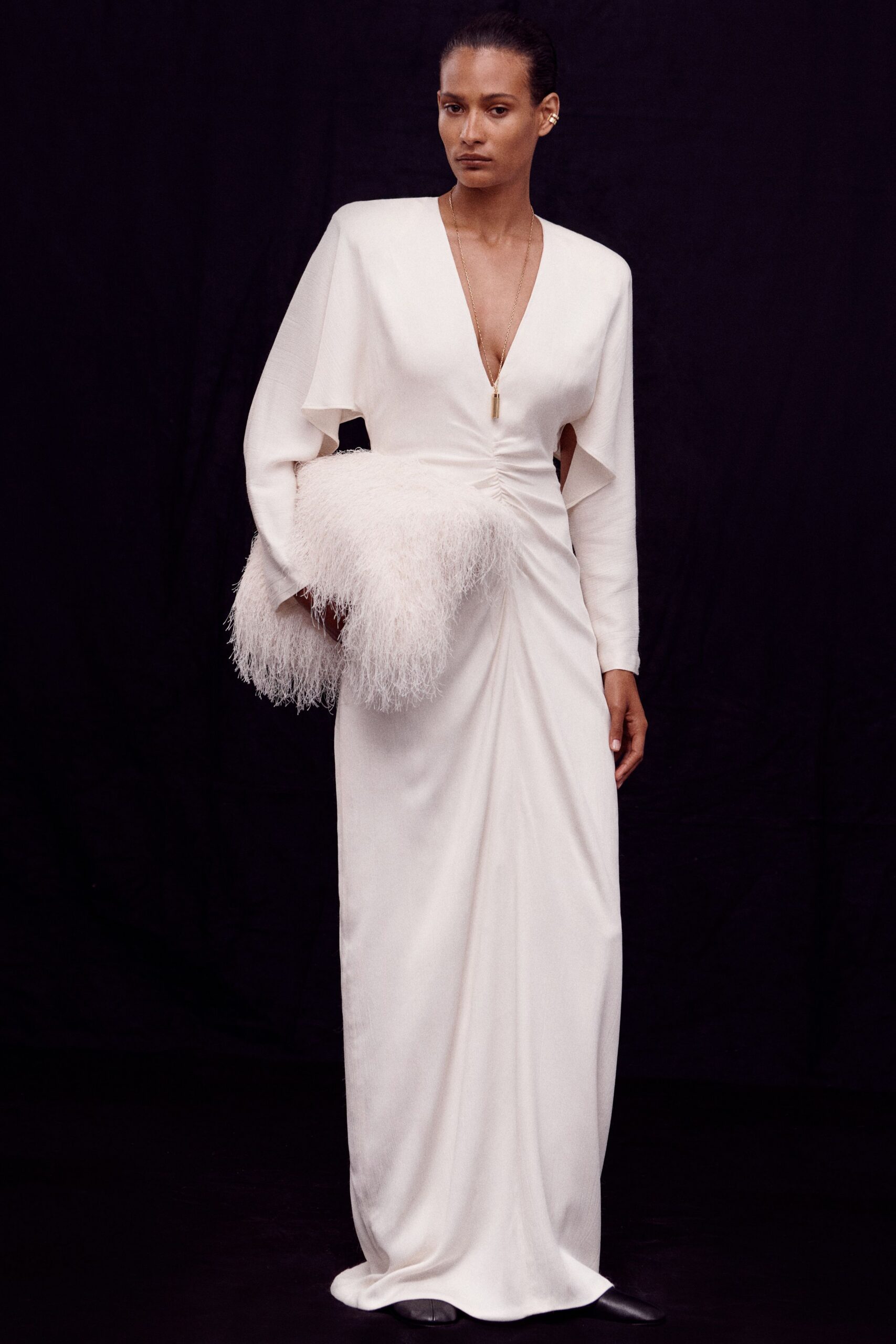 white silk long-sleeve v-neck fitted draped maxi gown