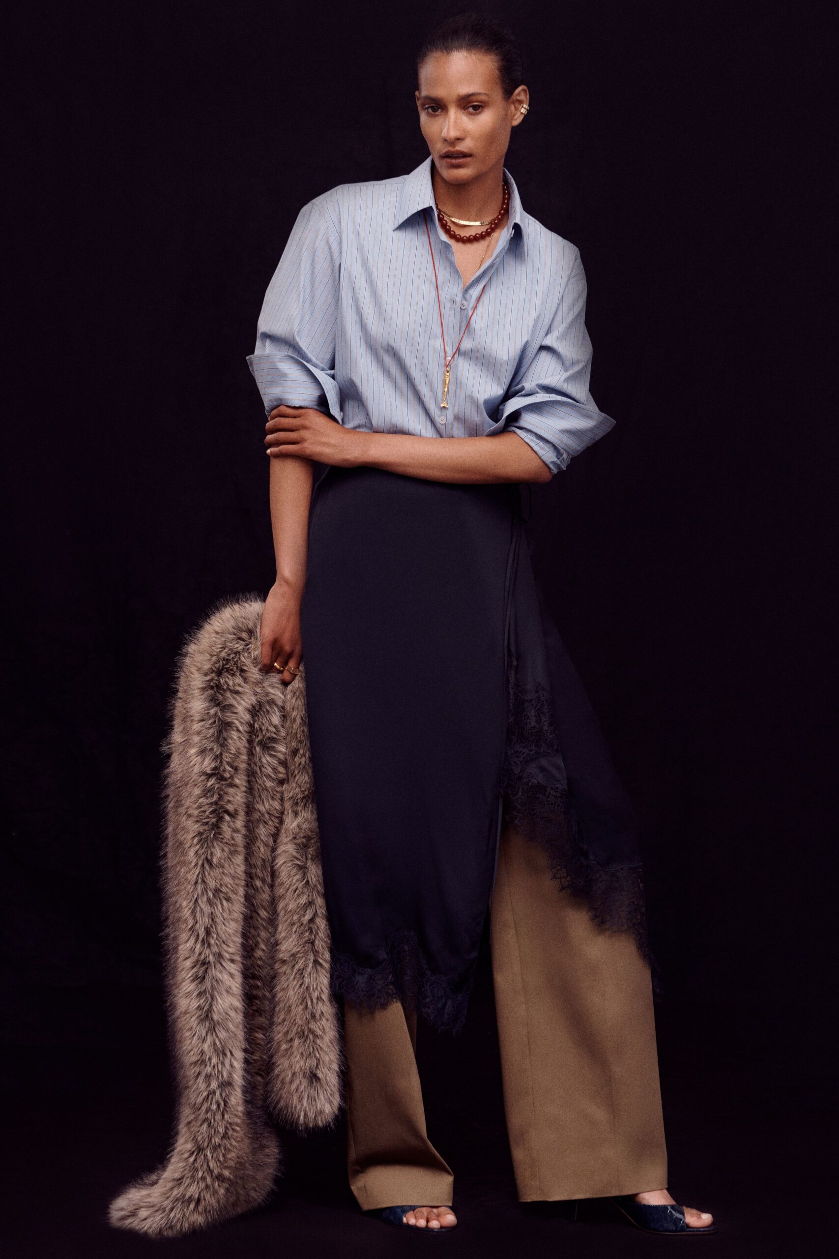 blue cotton shirt with layered black skirt