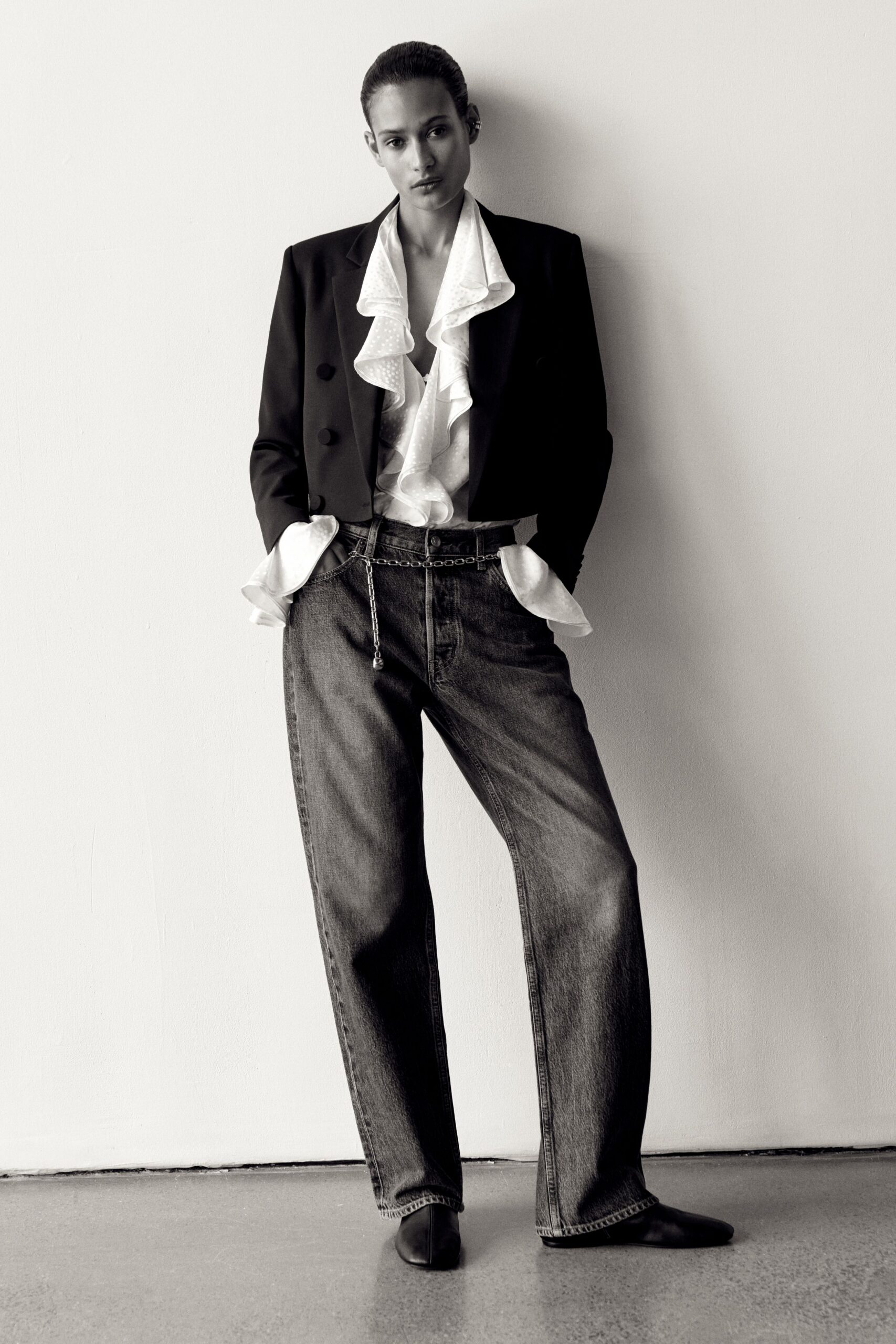 black blazer white ruffled blouse