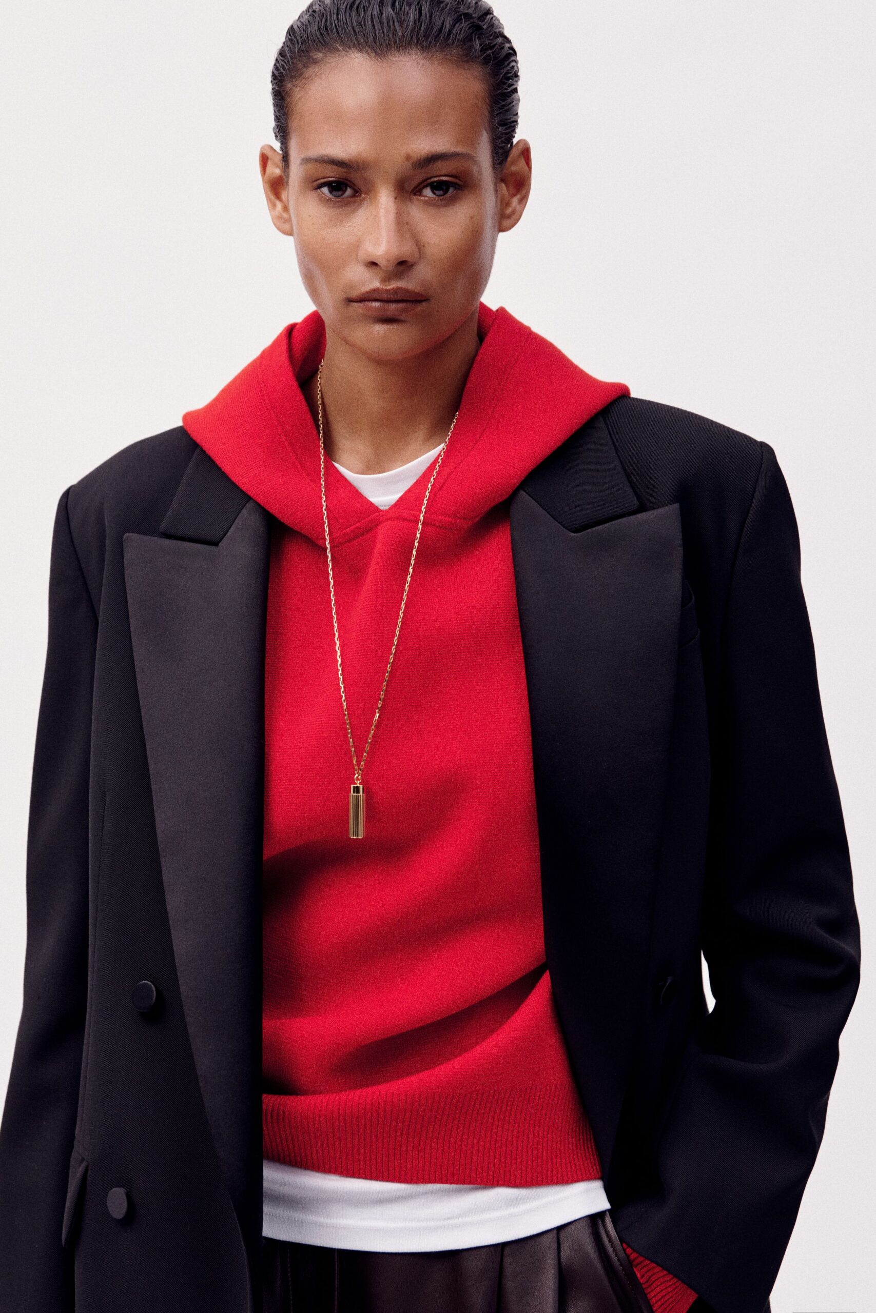 black blazer red hoodie white t-shirt leather skirt
