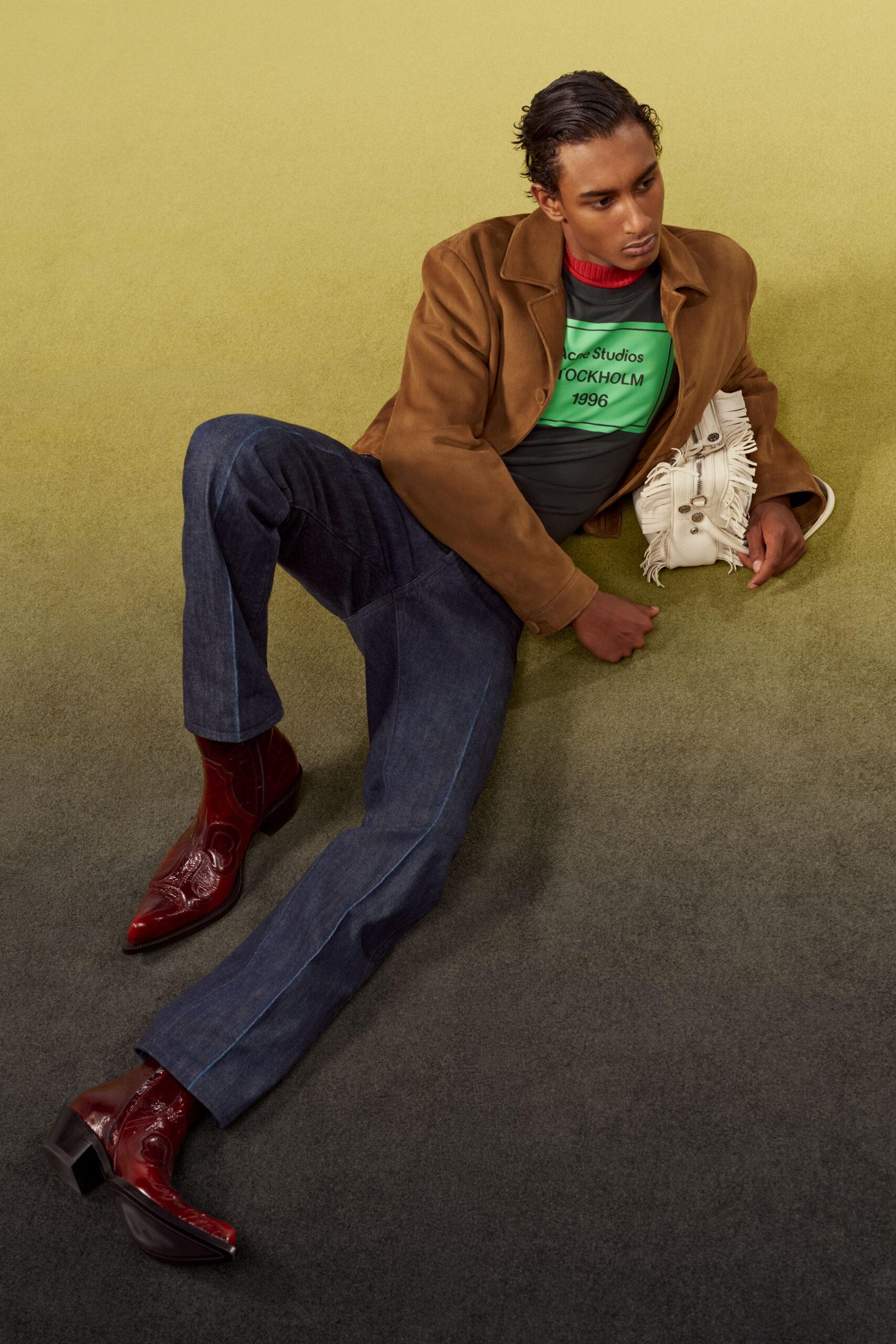 brown suede jacket with green t-shirt