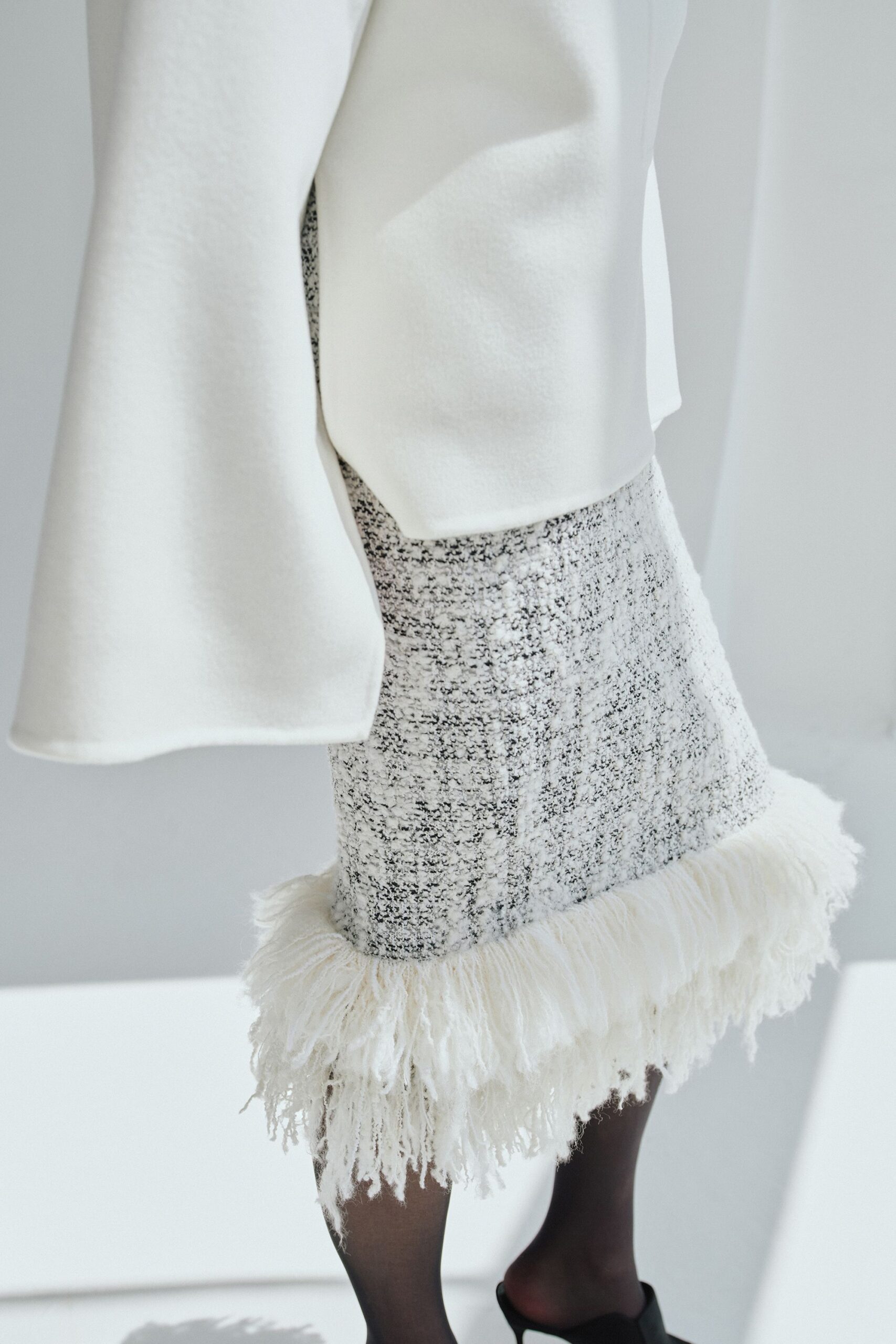 white cotton long-sleeve relaxed coat