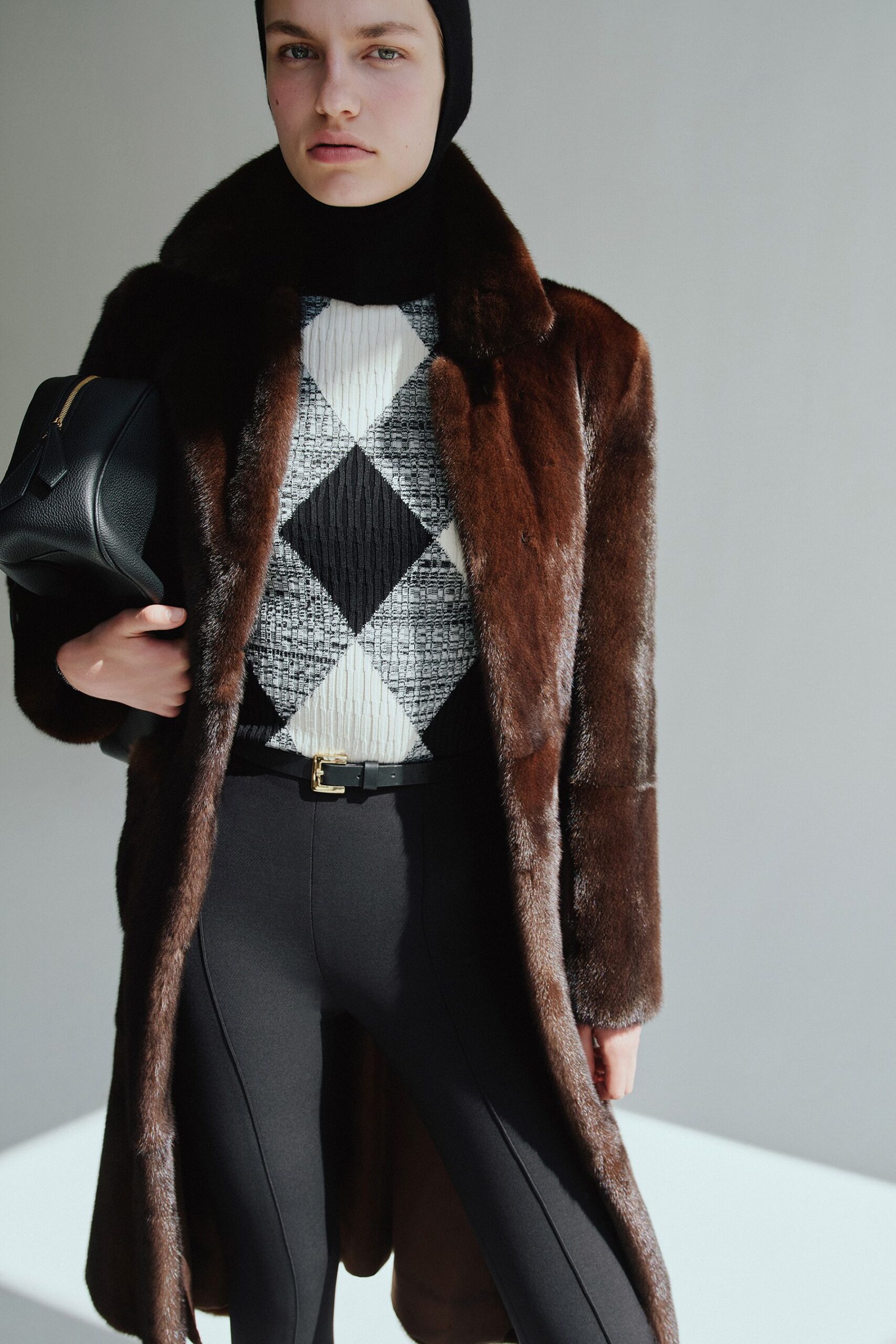 black knit long-sleeve high-neck fitted top
