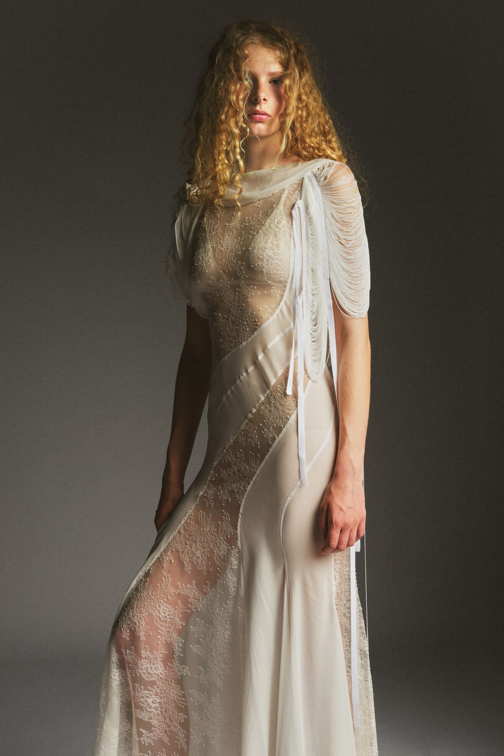 white silk embroidered gown
