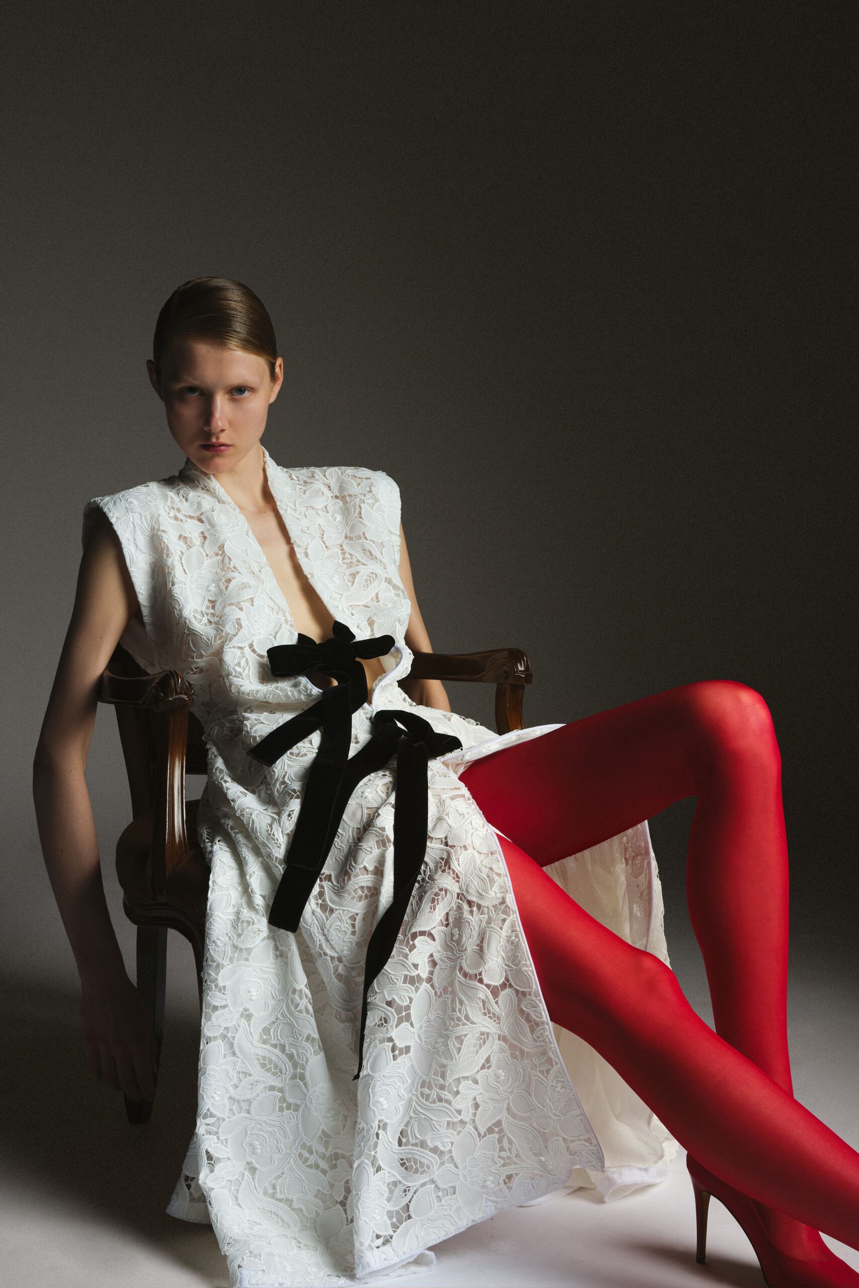 white lace belted midi dress with red shoes