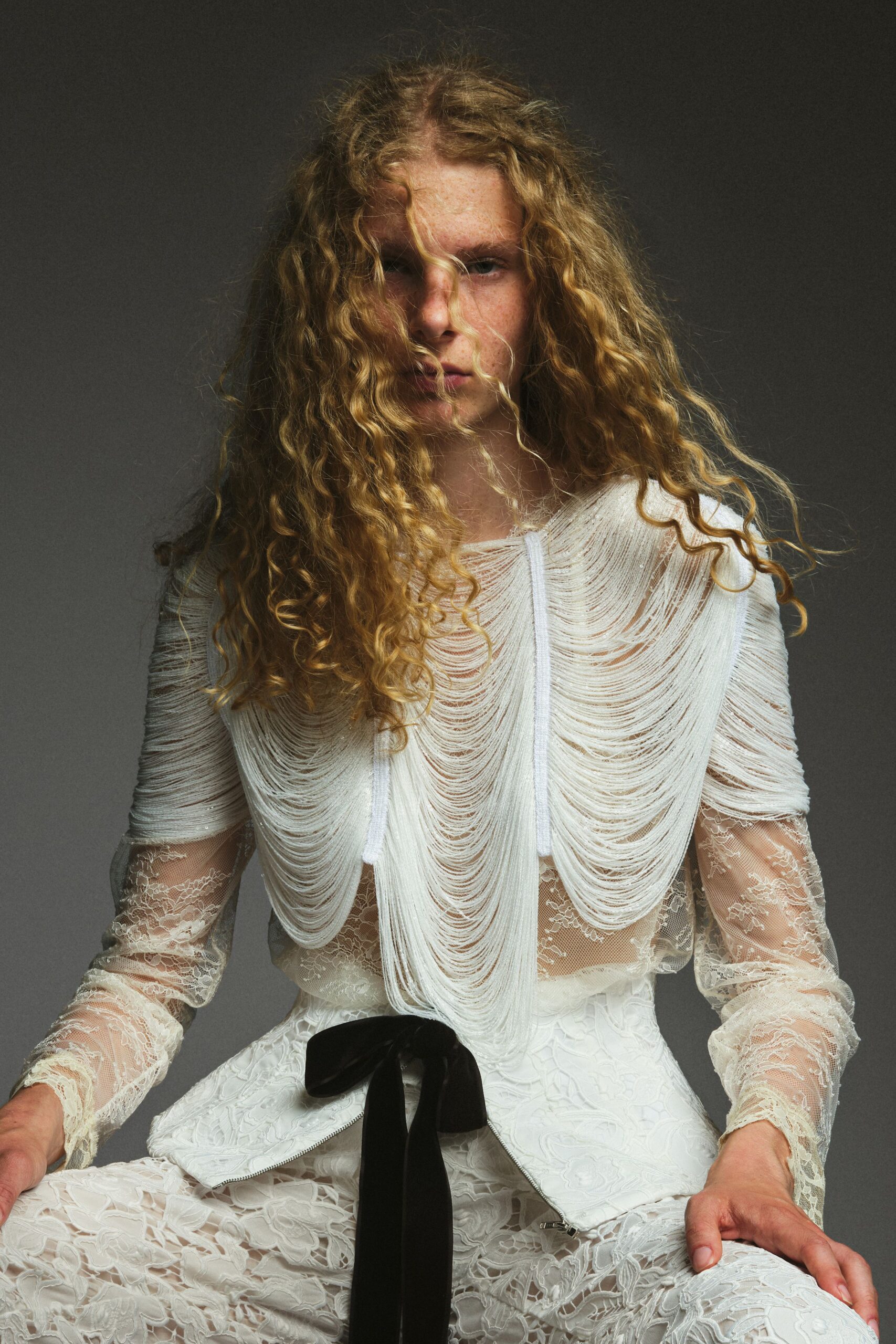 white lace long-sleeve collared fitted ruffled embroidered blouse