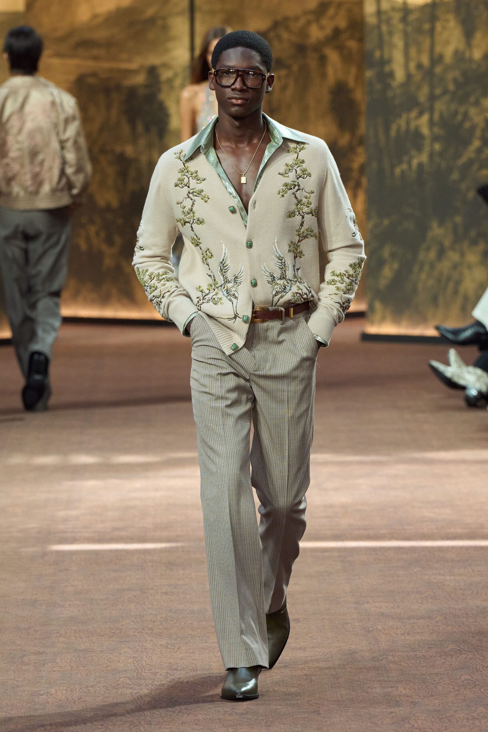 beige embroidered shirt gray pants