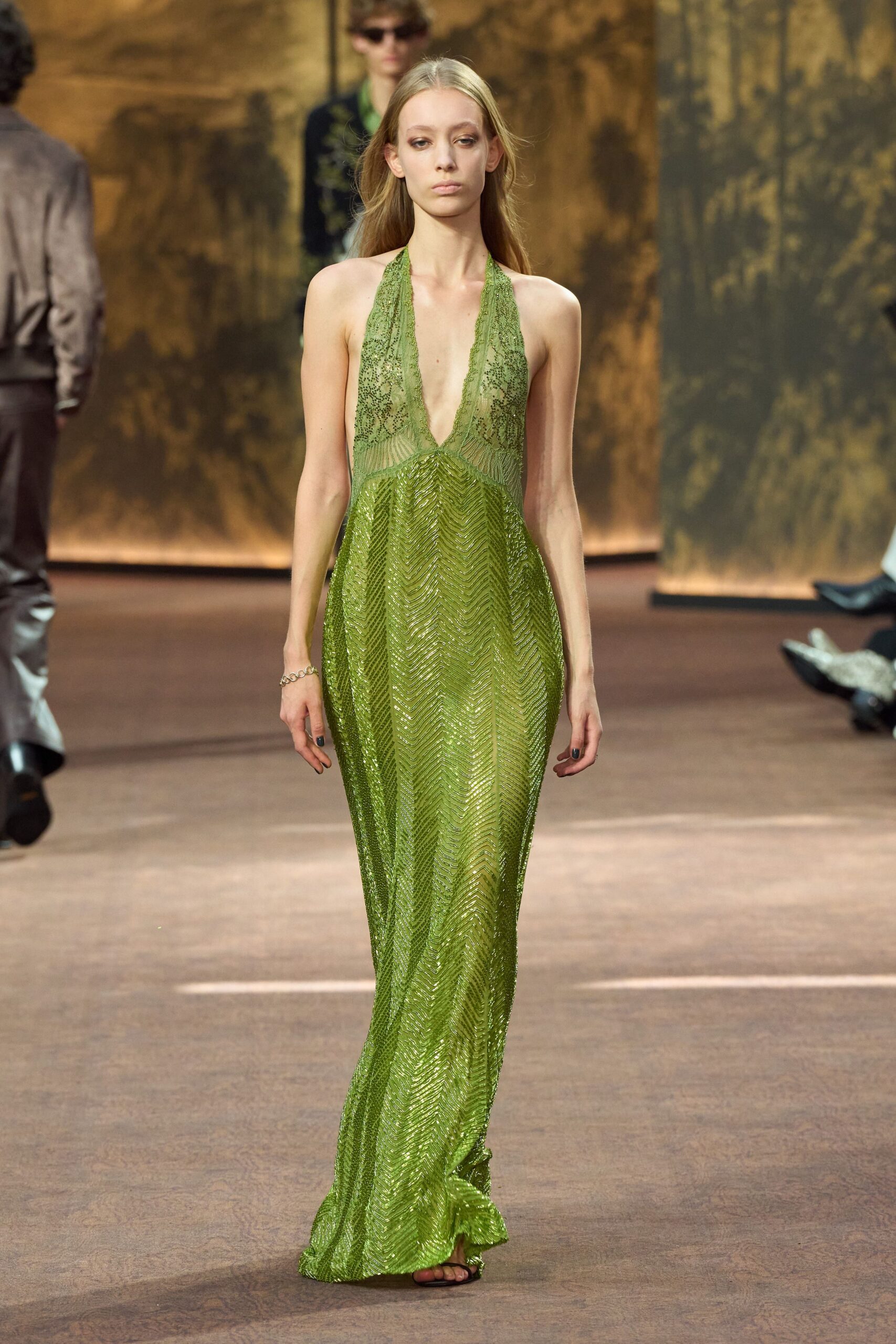 green silk sleeveless v-neck fitted pleated sheer gown