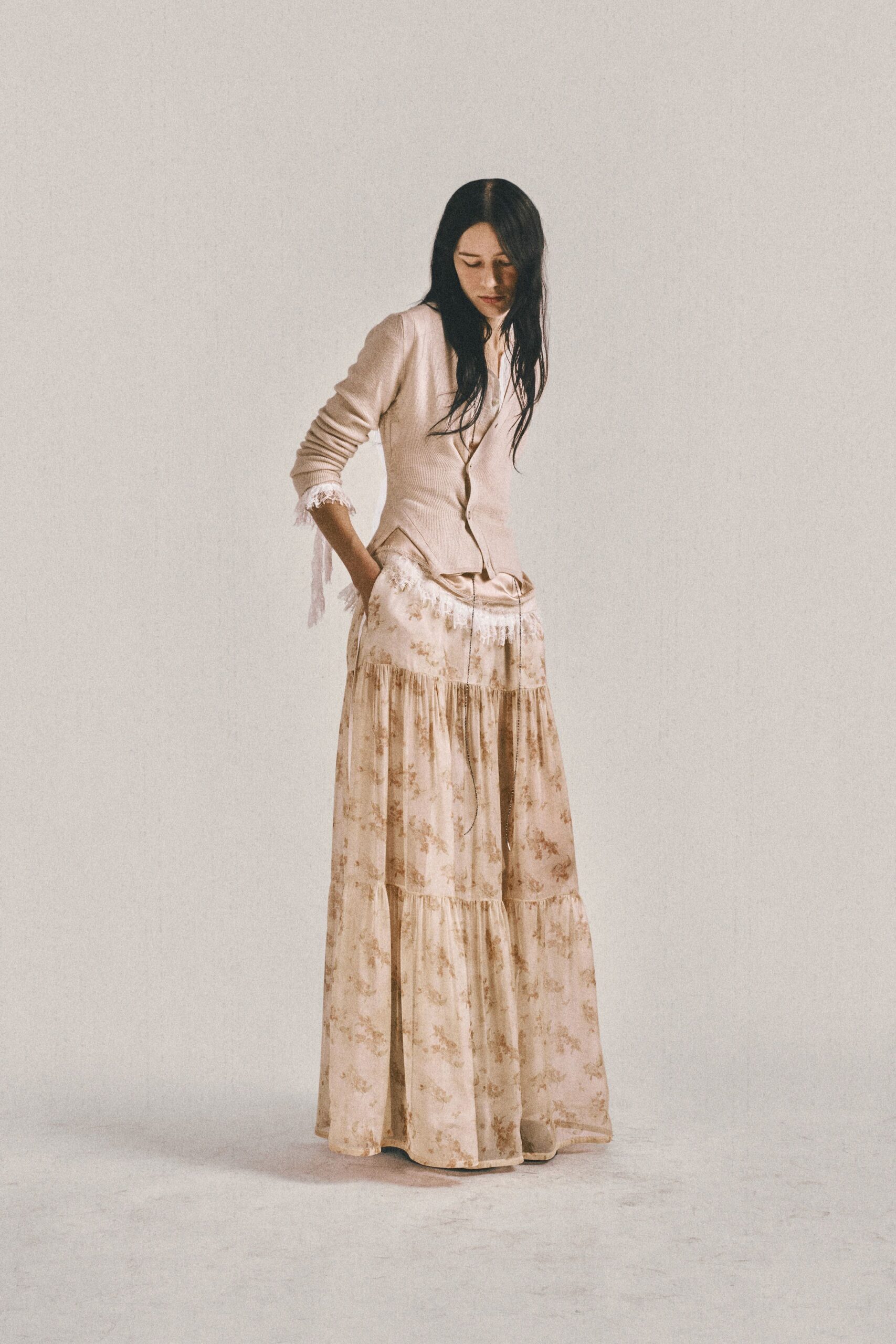 beige fitted blouse and tiered maxi skirt