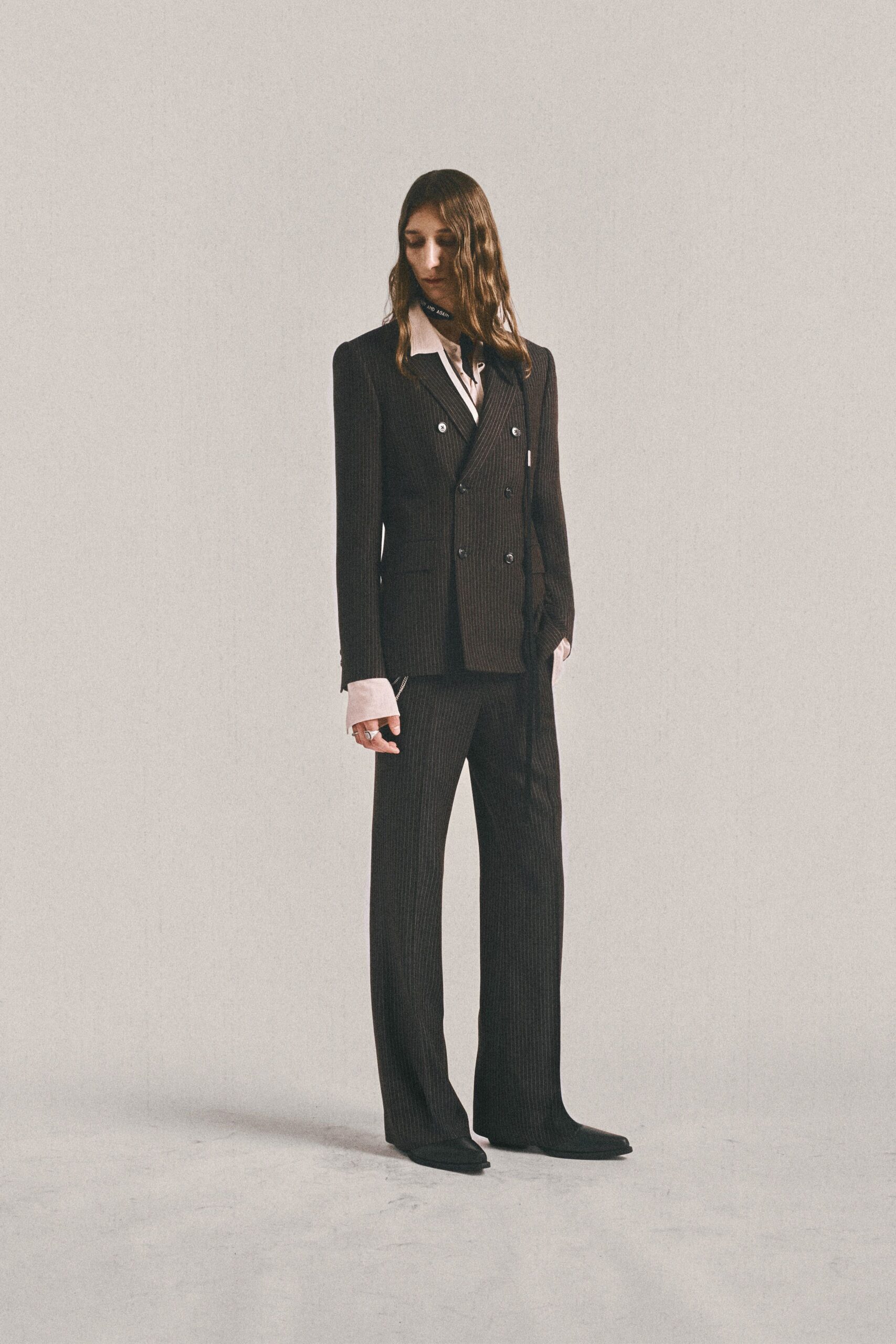 black wool long-sleeve collared tailored striped suit