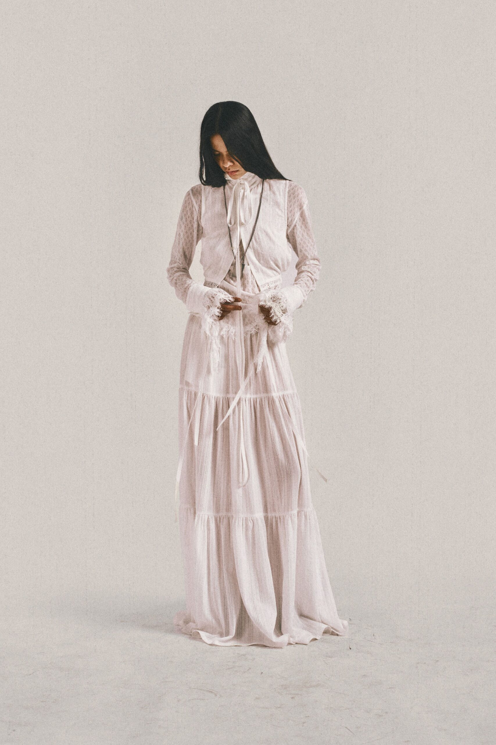 white cotton long-sleeve collared fitted ruffled blouse