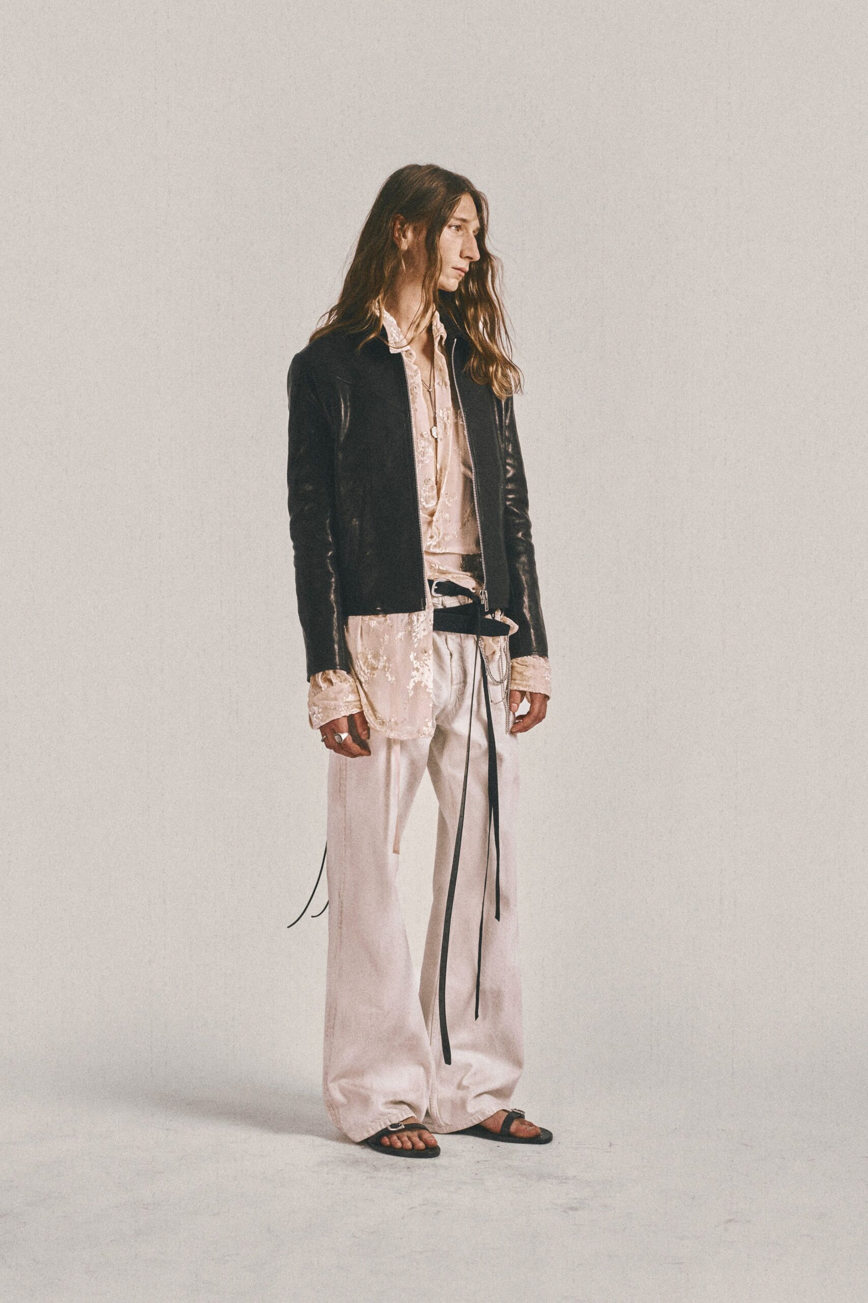 black leather jacket with pink shirt