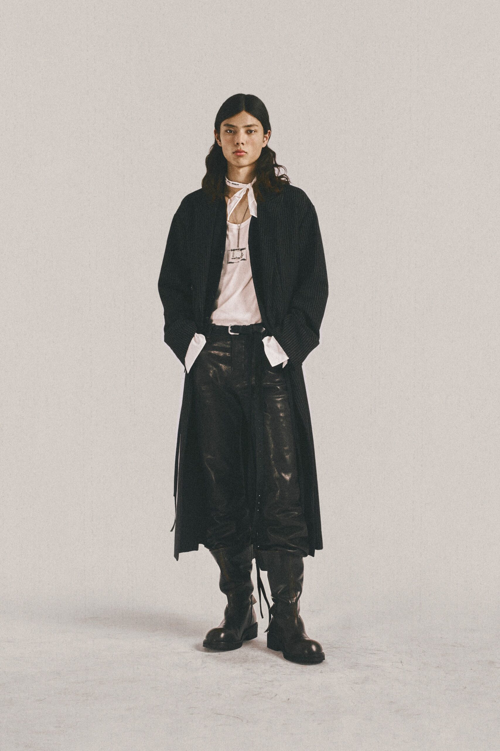 black cotton long-sleeve collared relaxed buttoned coat