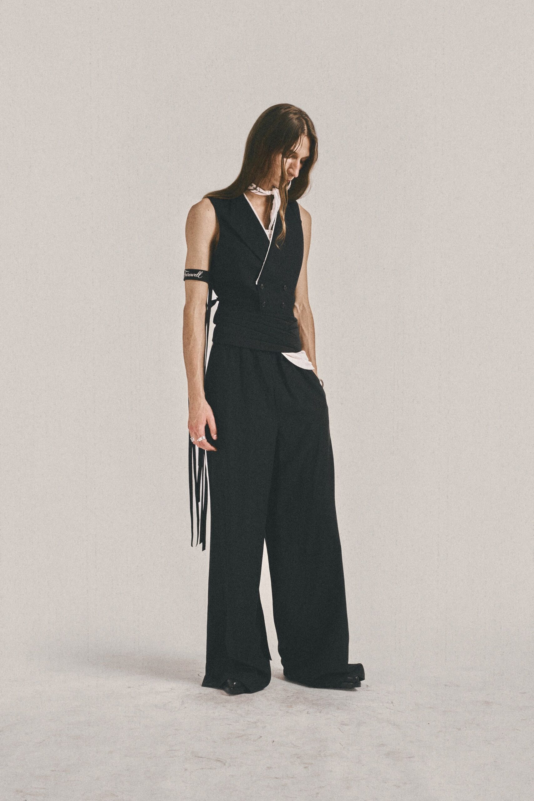 black fitted top and relaxed pants